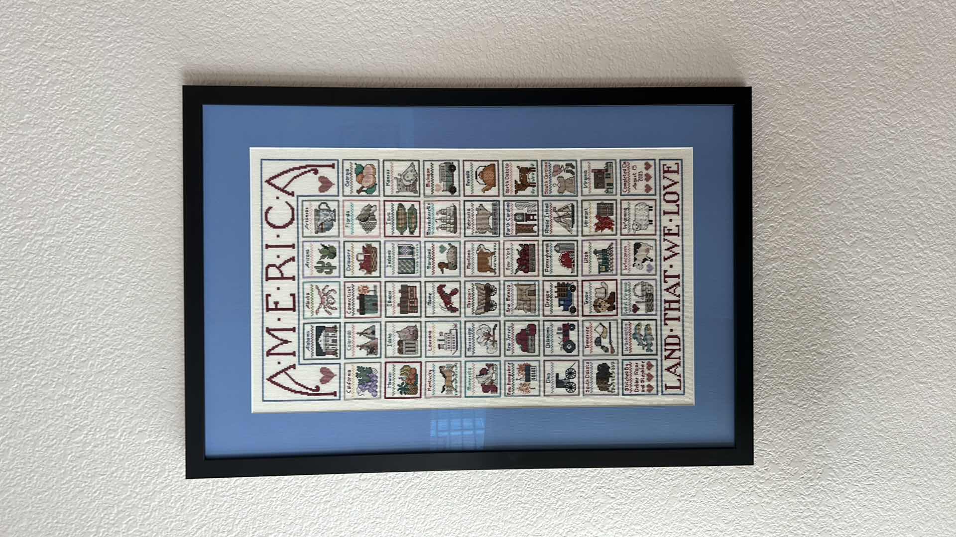Photo 1 of BLACK FRAMED CROSS STITCH PATTERN “ AMERICA LAND THAT WE LOVE” BY JEAN FARISH 21” X 30”