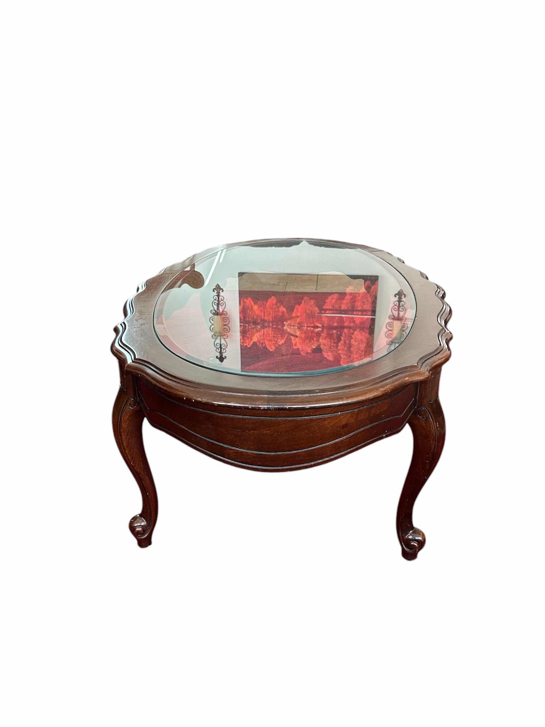 Photo 1 of WOOD AND BEVELED GLASS COFFEE TABLE 25” X 45” H 17”