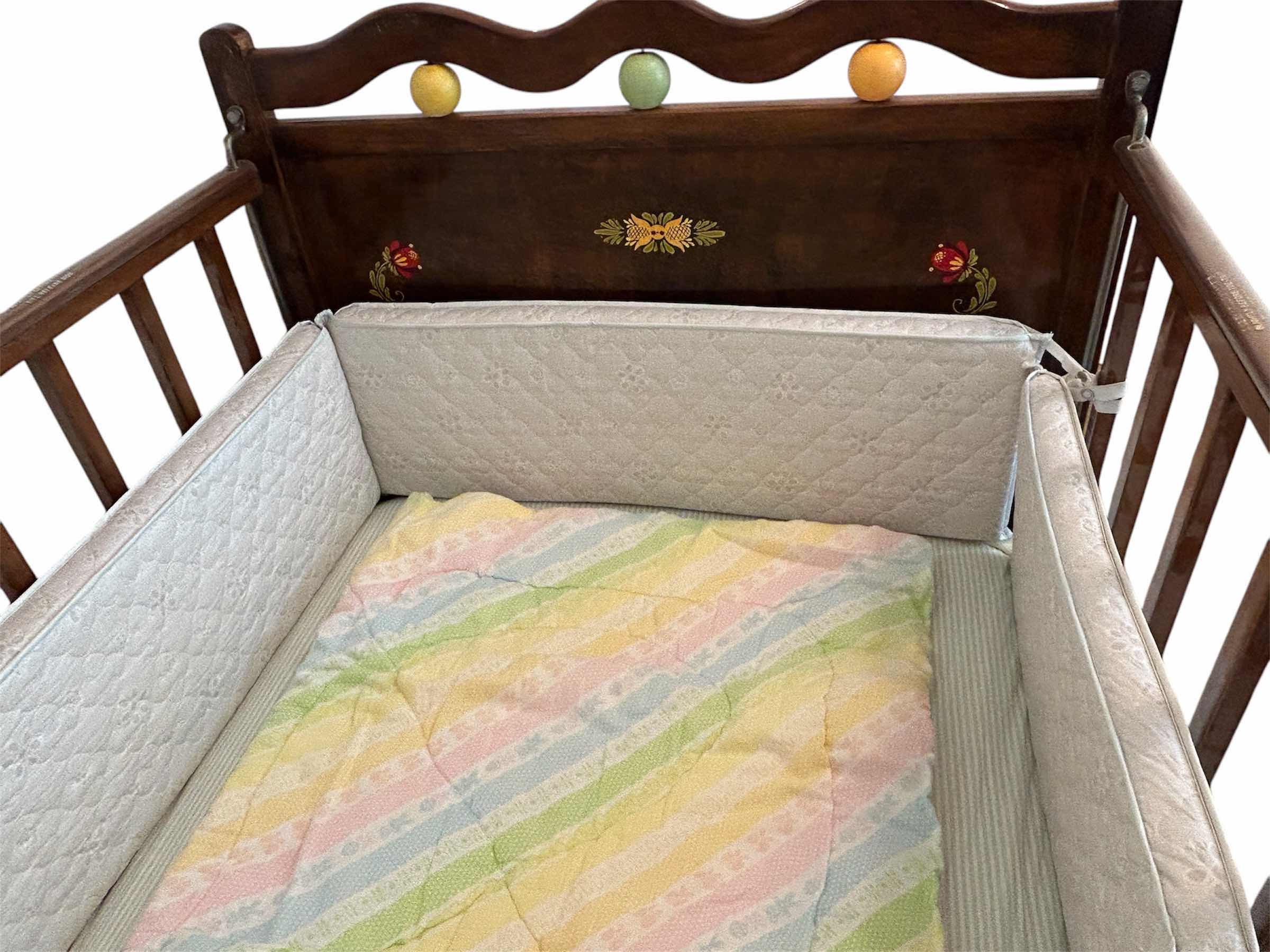 Photo 3 of VINTAGE WOODEN BABY CRIB MID 20th CENTURY FEATURING A DROP SIDE MECHANISM 54” X 30” H 44”