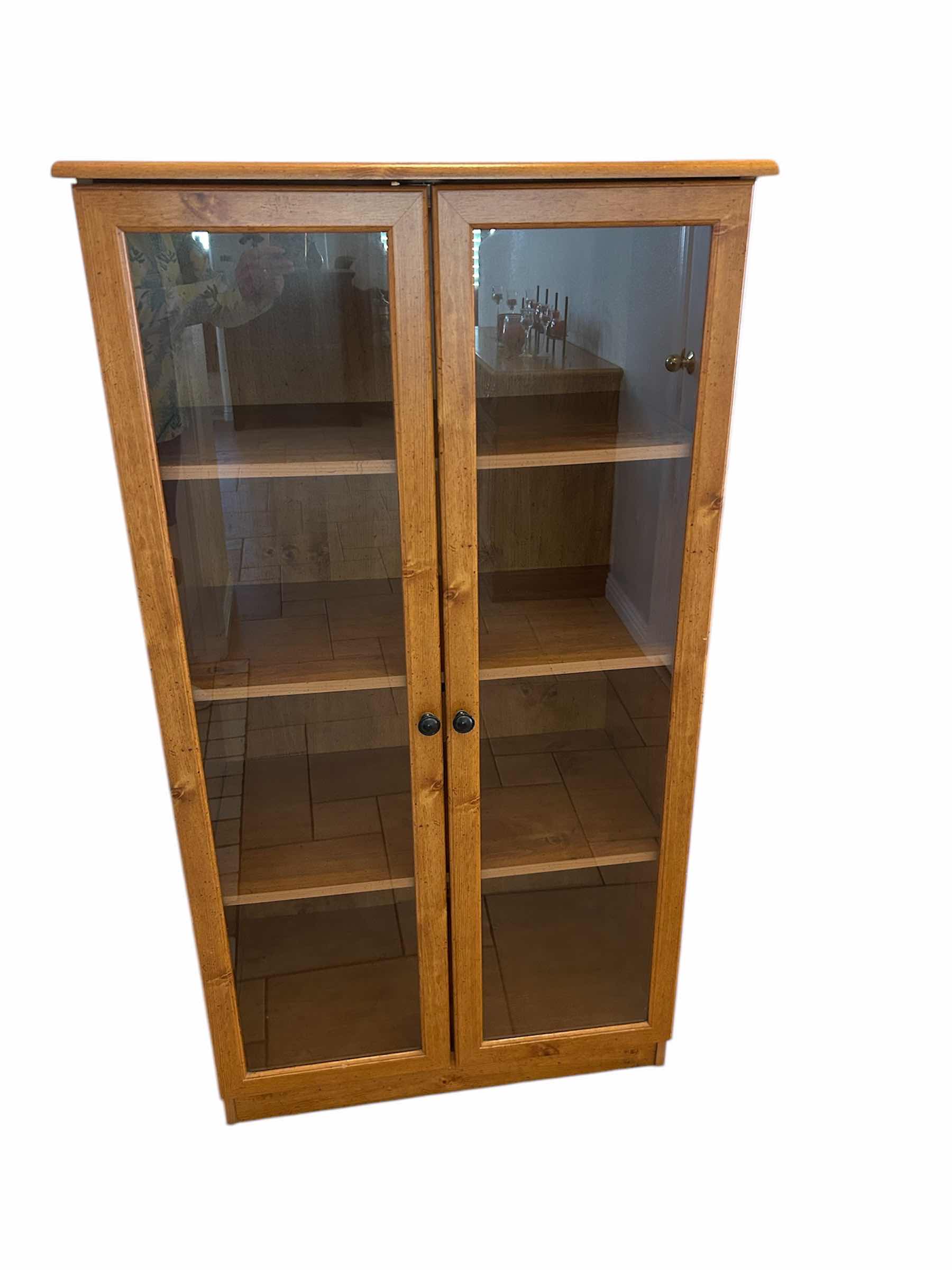 Photo 1 of LIGHTED WOODEN CABINET W 2 DOORS 30” X 26” H 33”