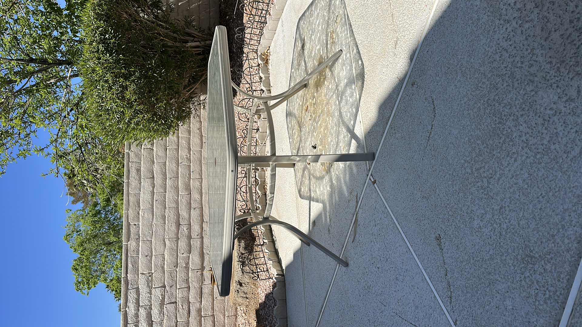 Photo 1 of 55” ROUND GLASS TOP WROUGHT IRON PATIO TABLE H28”