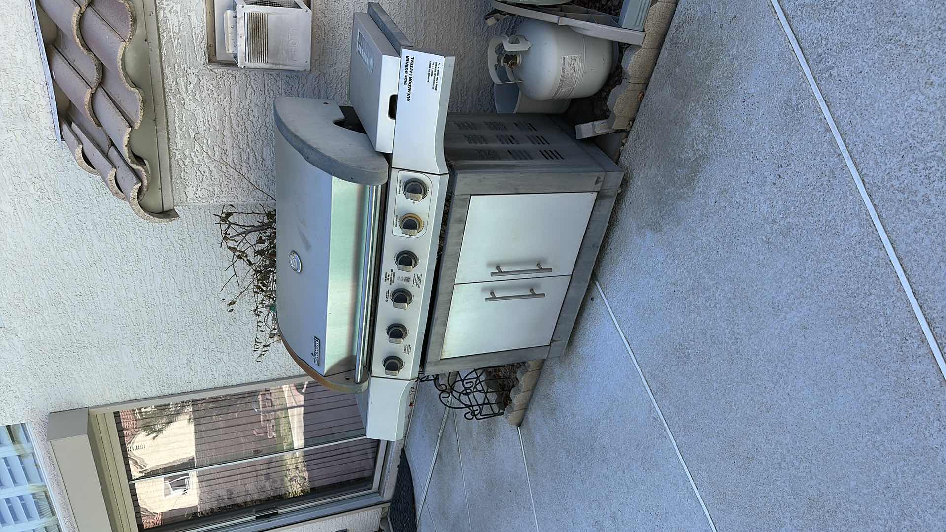 Photo 1 of BRINKMANN OUTDOOR PROPANE BBQ USED NEEDS TLC TWO PROPANE TANKS