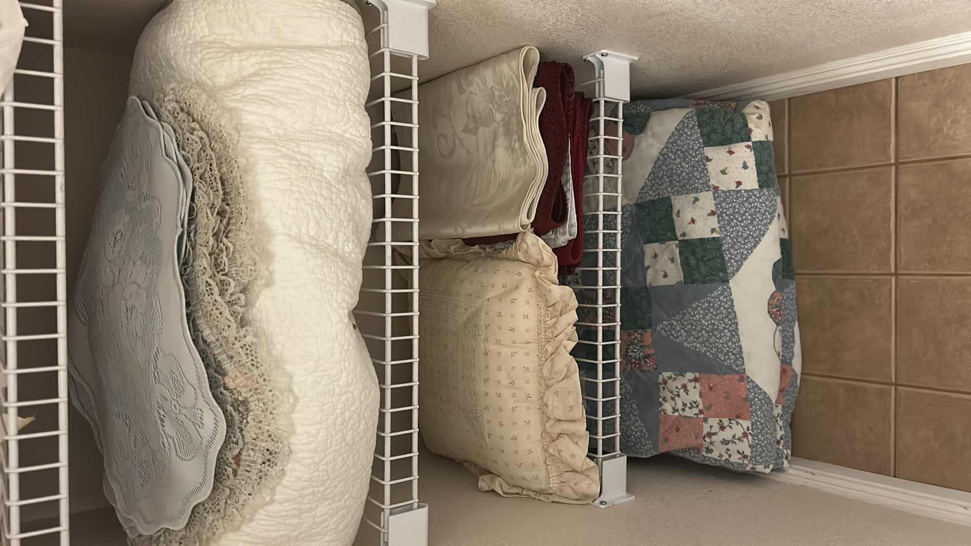 Photo 4 of CONTENTS OF CLOSET ASSORTED SHEETS QUILTS PLACEMATS