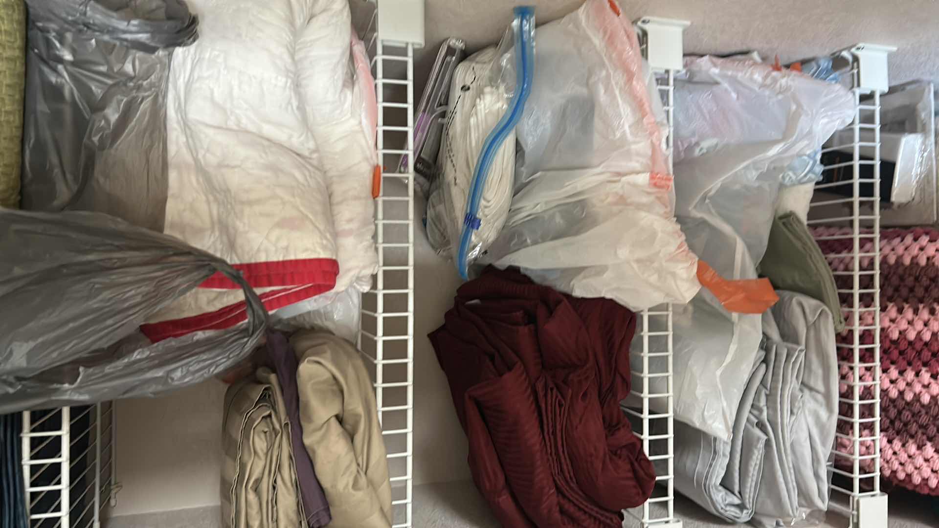 Photo 1 of CONTENTS OF CLOSET BEDDING