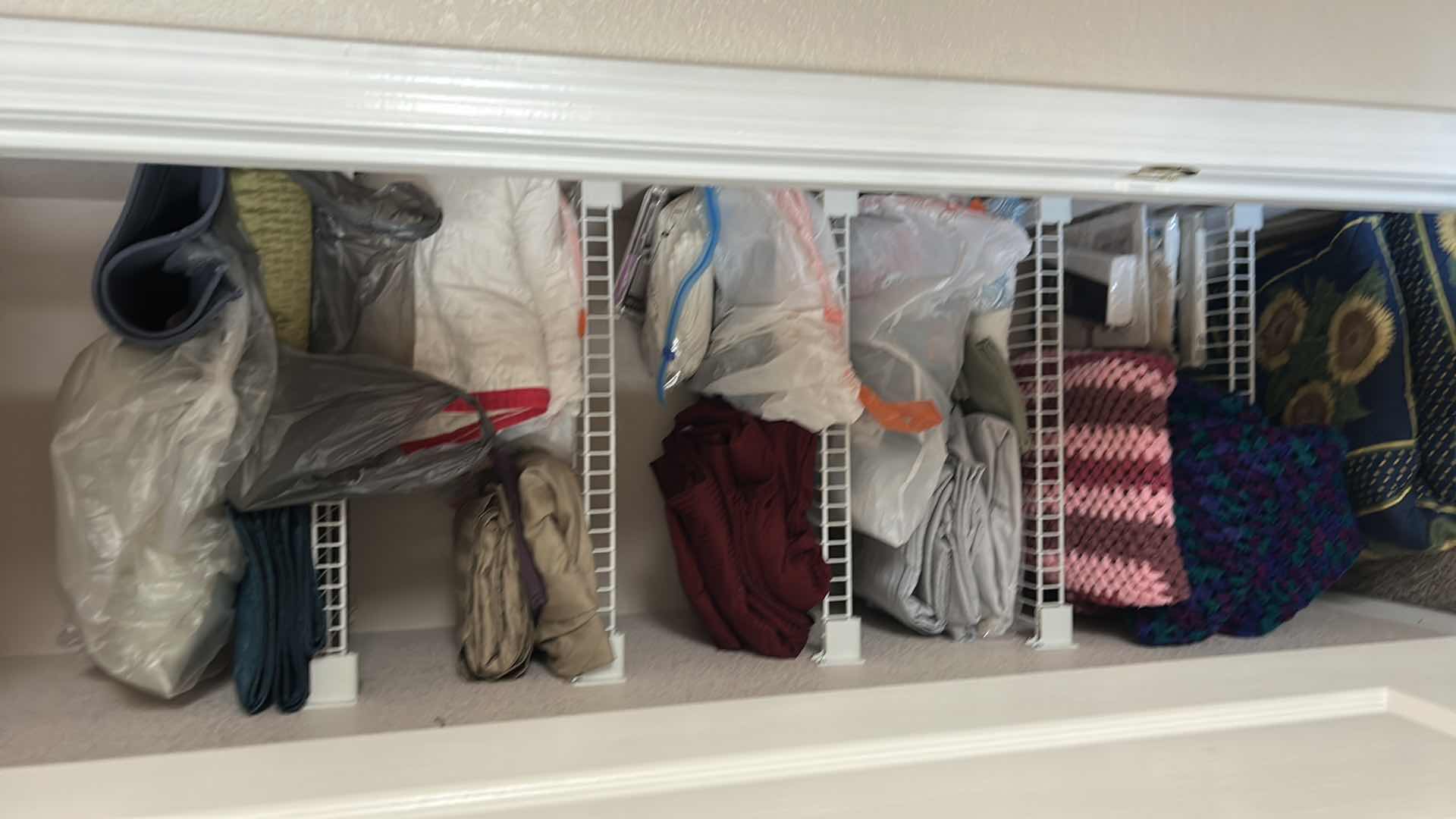 Photo 1 of CONTENTS OF CLOSET BEDDING