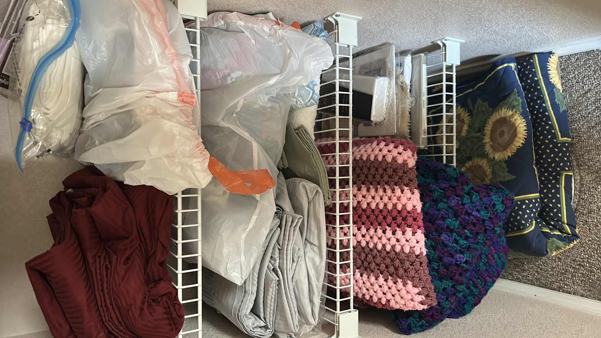 Photo 1 of CONTENTS OF CLOSET BEDDING