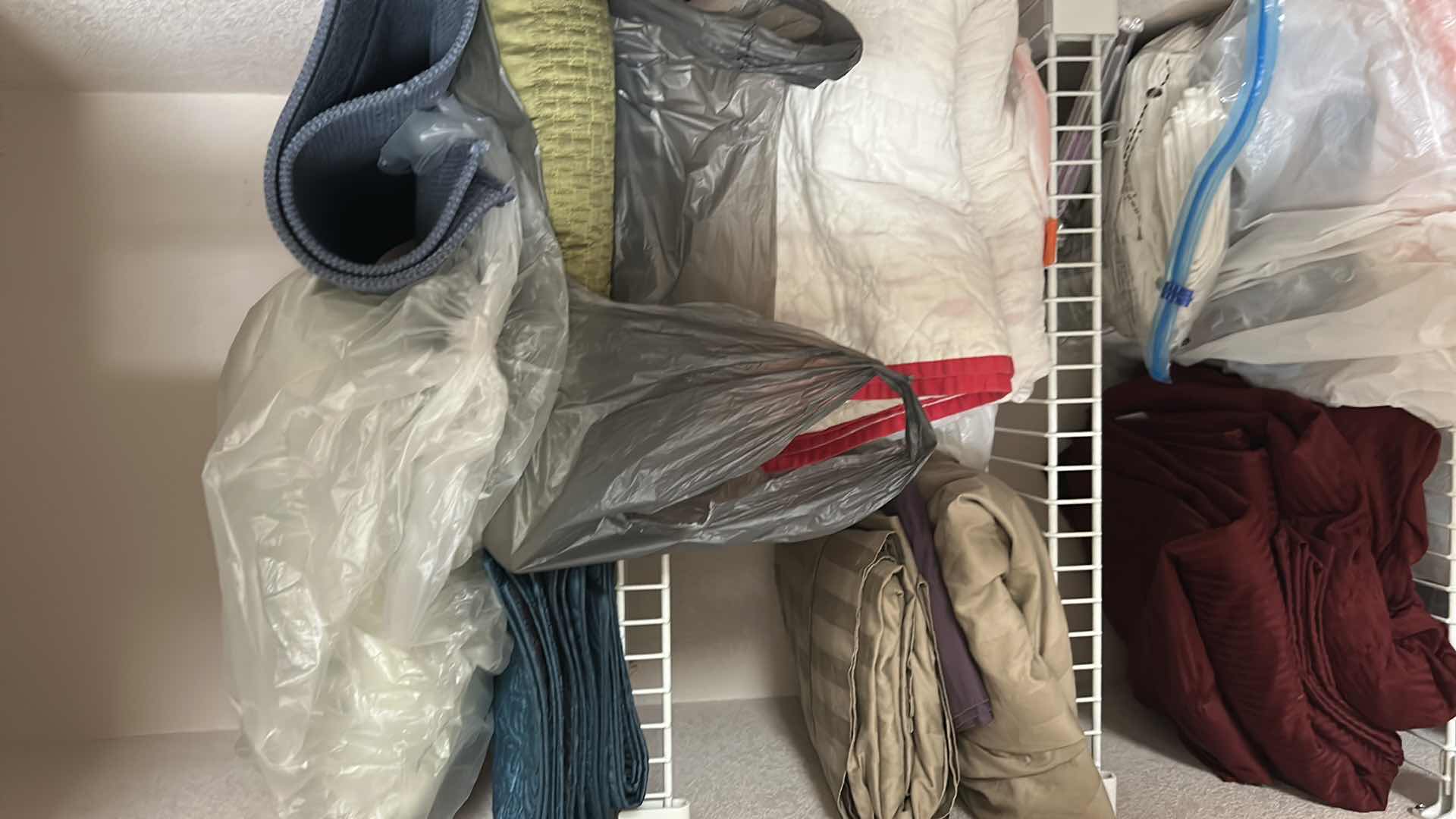 Photo 1 of CONTENTS OF CLOSET BEDDING