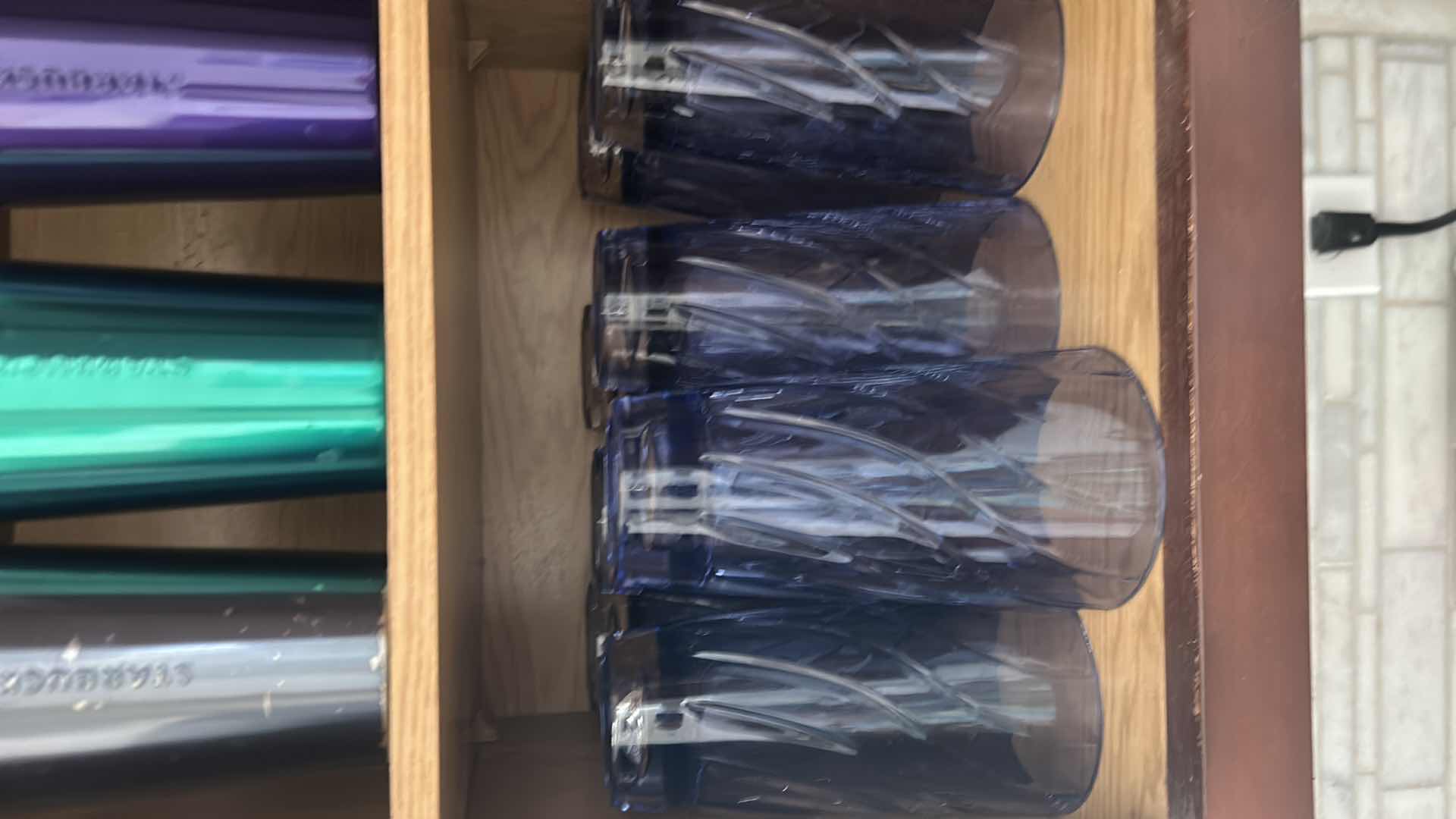 Photo 1 of CONTENTS OF SHELF 8 BLUE PLASTIC TUMBLERS 3 STARBUCKS COFFEE