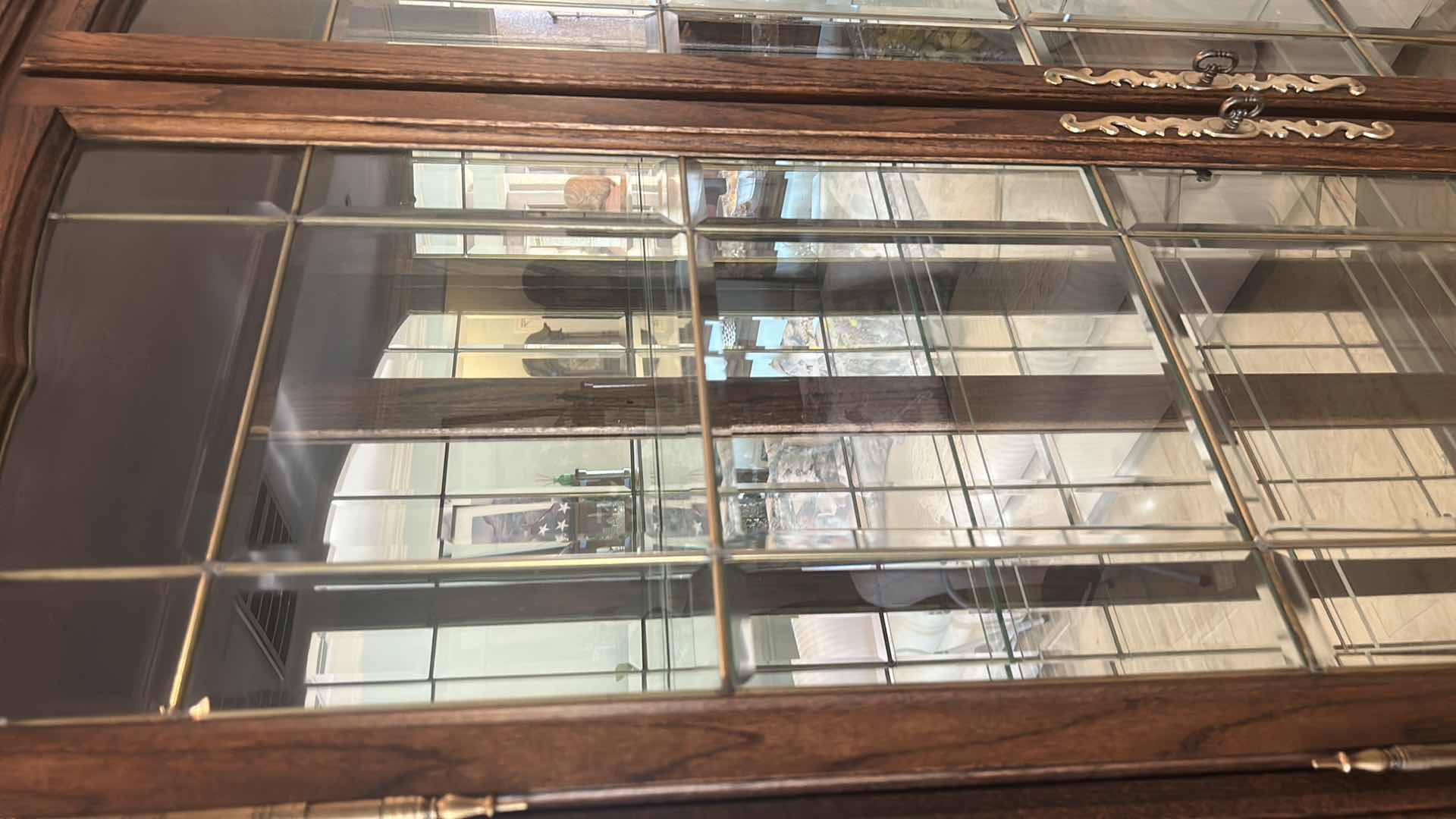 Photo 1 of LIGHTED CHINA HUTCH WITH BEVELED GLASS AND METAL DETAILING 5’ X 19” X 78.5”