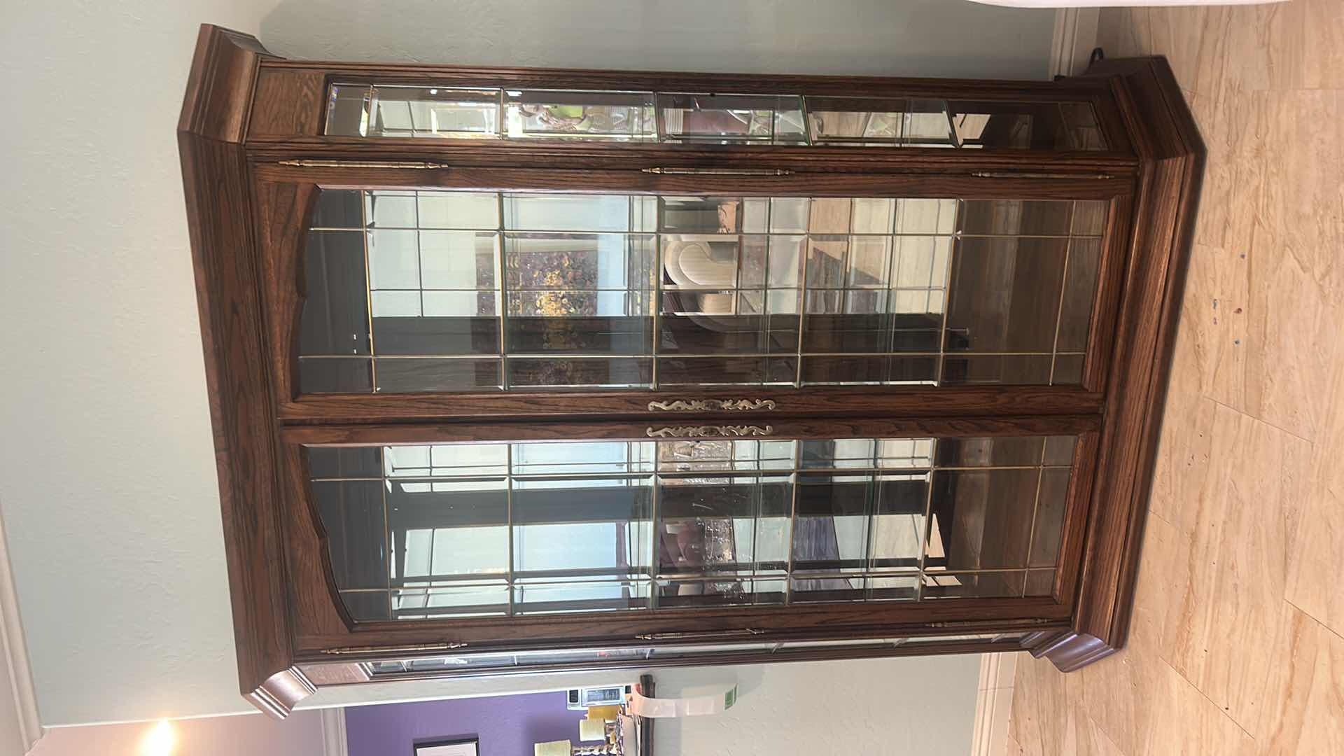 Photo 1 of LIGHTED CHINA HUTCH WITH BEVELED GLASS AND METAL DETAILING 5’ X 19” X 78.5”