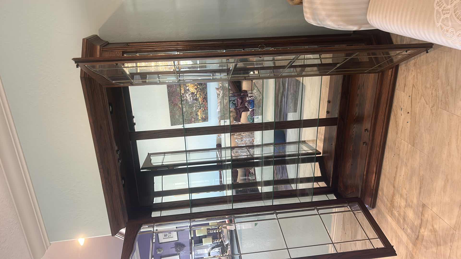 Photo 1 of LIGHTED CHINA HUTCH WITH BEVELED GLASS AND METAL DETAILING 5’ X 19” X 78.5”