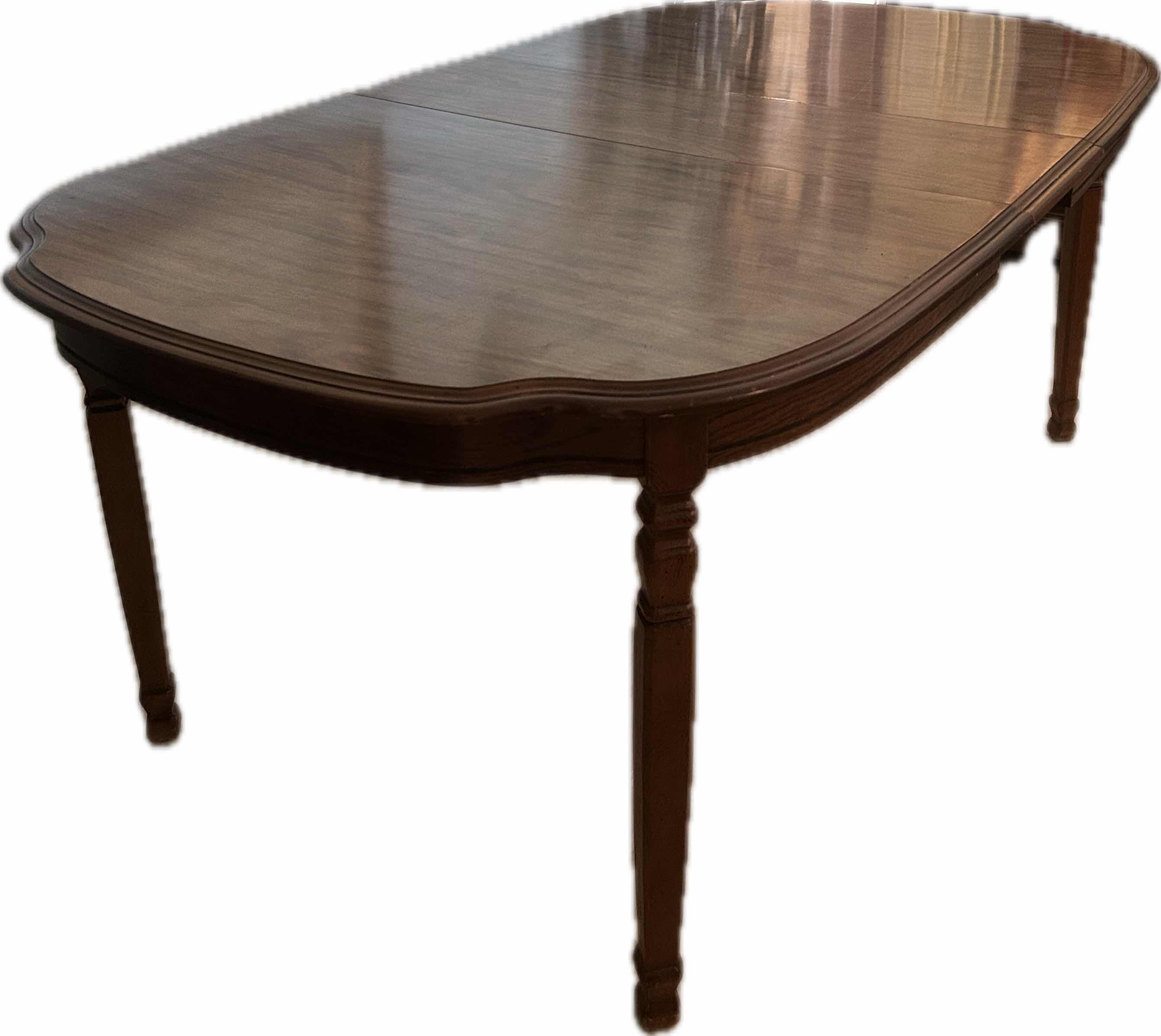 Photo 1 of RECTANGULAR TRADITIONAL WOODEN DINING TABLE 75" X 40" W 2  12" LEAVES CHAIRS SOLD SEPARATELY