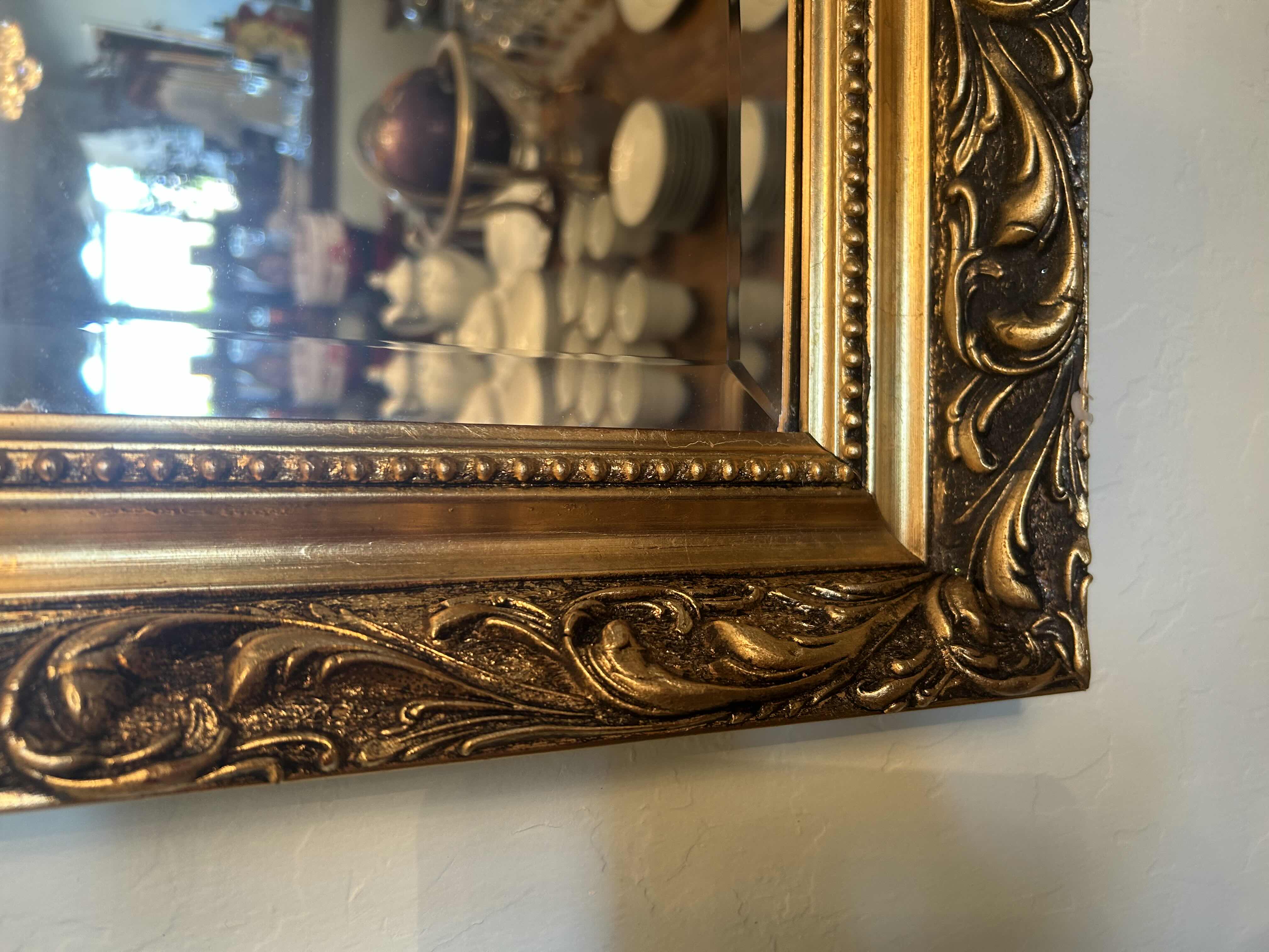 Photo 1 of GOLD ORNATE WALL MIRROR 53"
X 40"