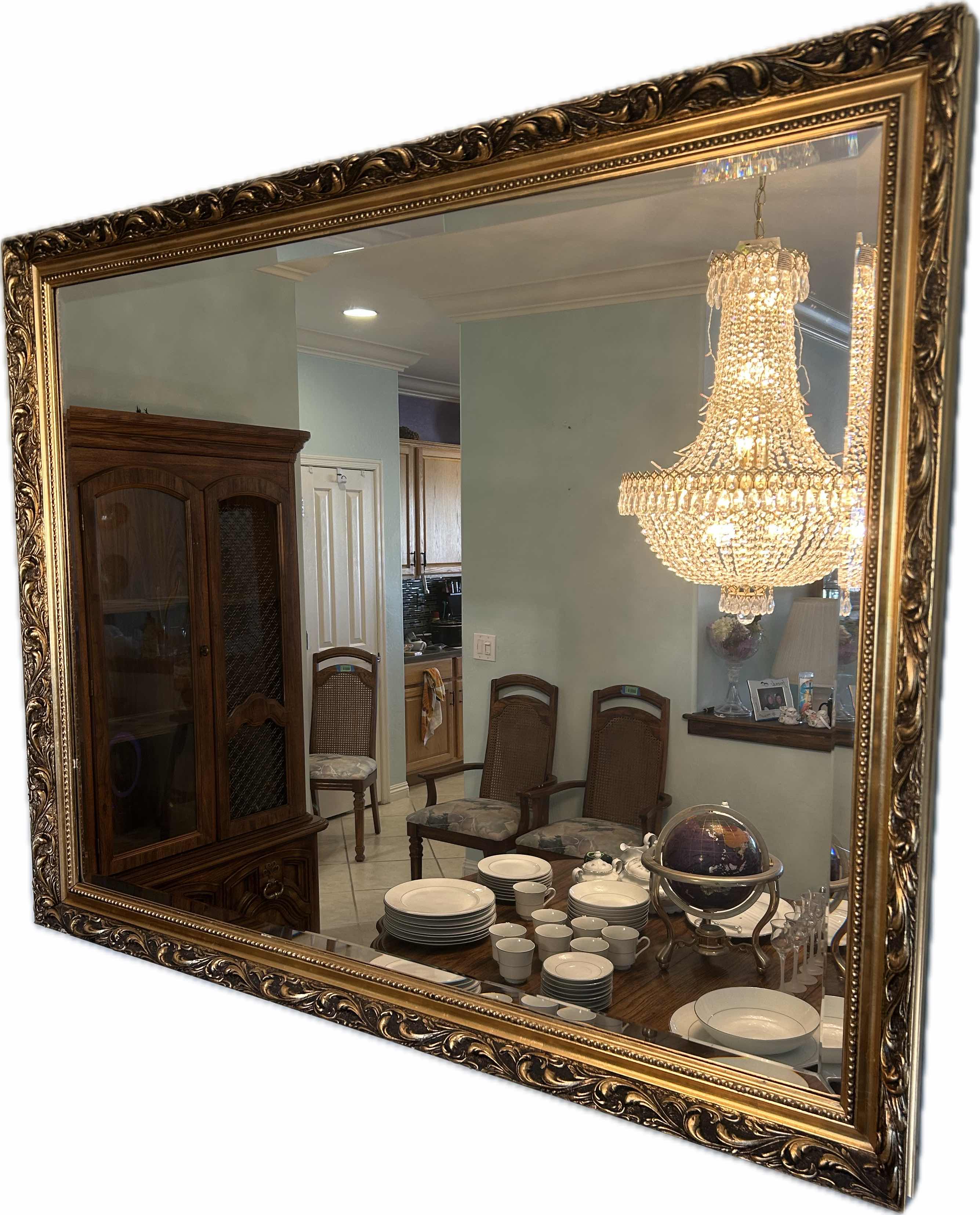 Photo 1 of GOLD ORNATE WALL MIRROR 53"
X 40"