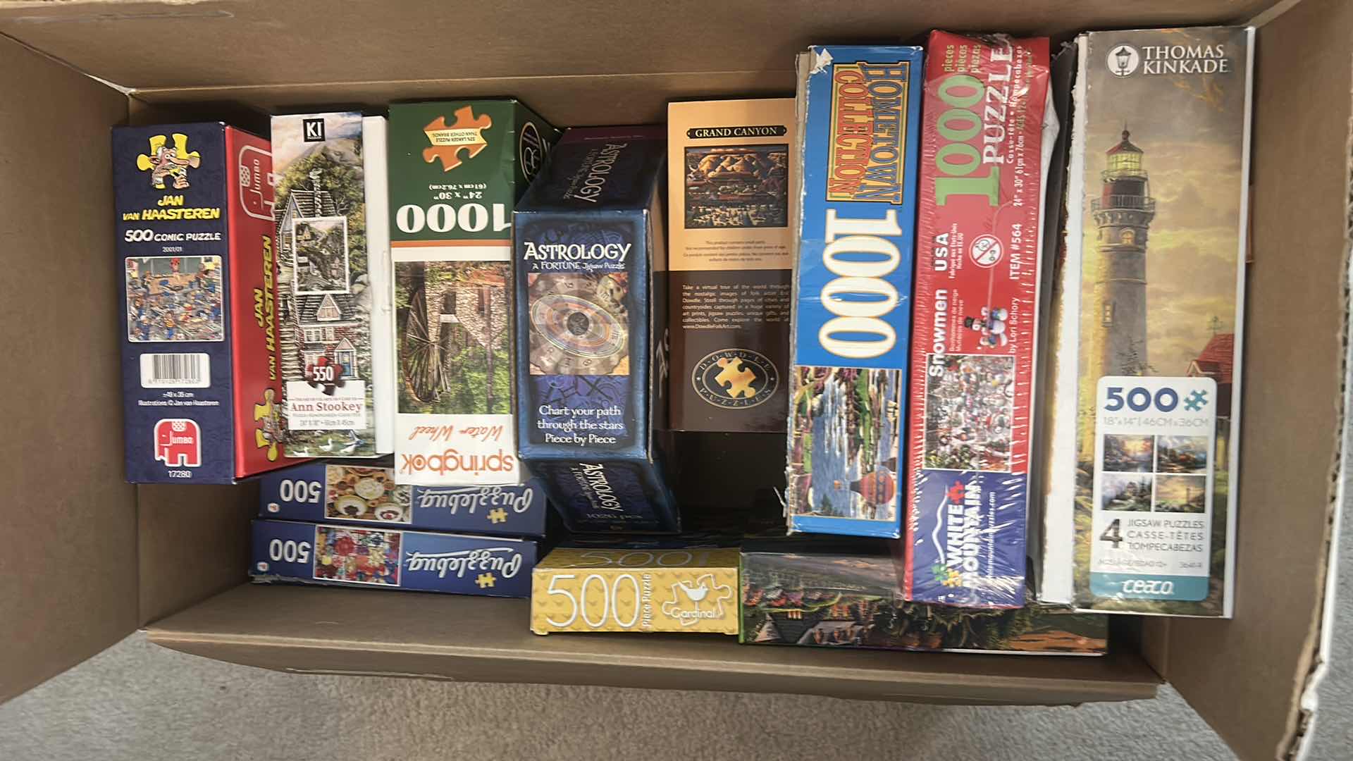 Photo 1 of 2 BOXES OF PUZZLES