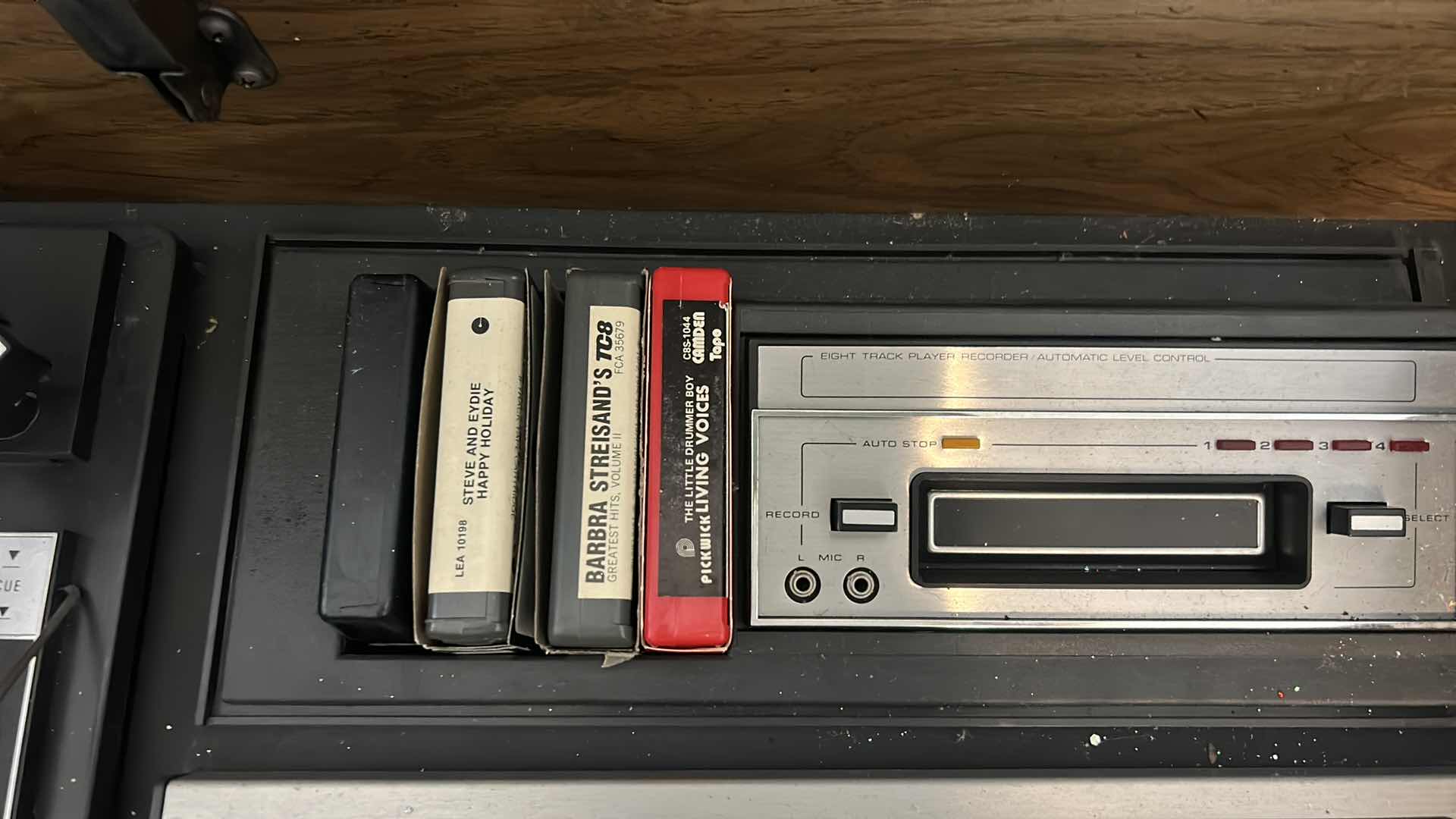 Photo 1 of VINTAGE MAGNAVOX RECORD PLAYER CABINET  WITH MAGNAVOX RADIO, 8 TRACK PLAYER,  ALBUMS &  MORE 6“ x 16“ x H27“