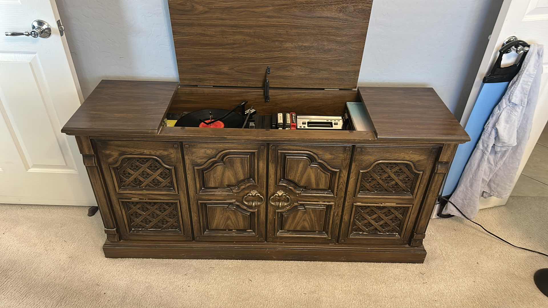 Photo 1 of VINTAGE MAGNAVOX RECORD PLAYER CABINET  WITH MAGNAVOX RADIO, 8 TRACK PLAYER,  ALBUMS &  MORE 6“ x 16“ x H27“