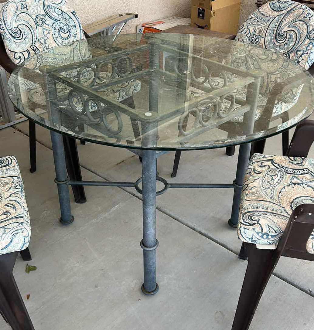 Photo 1 of ROUND GLASS TOP OUTDOOR TABLE W 4 CHAIRS