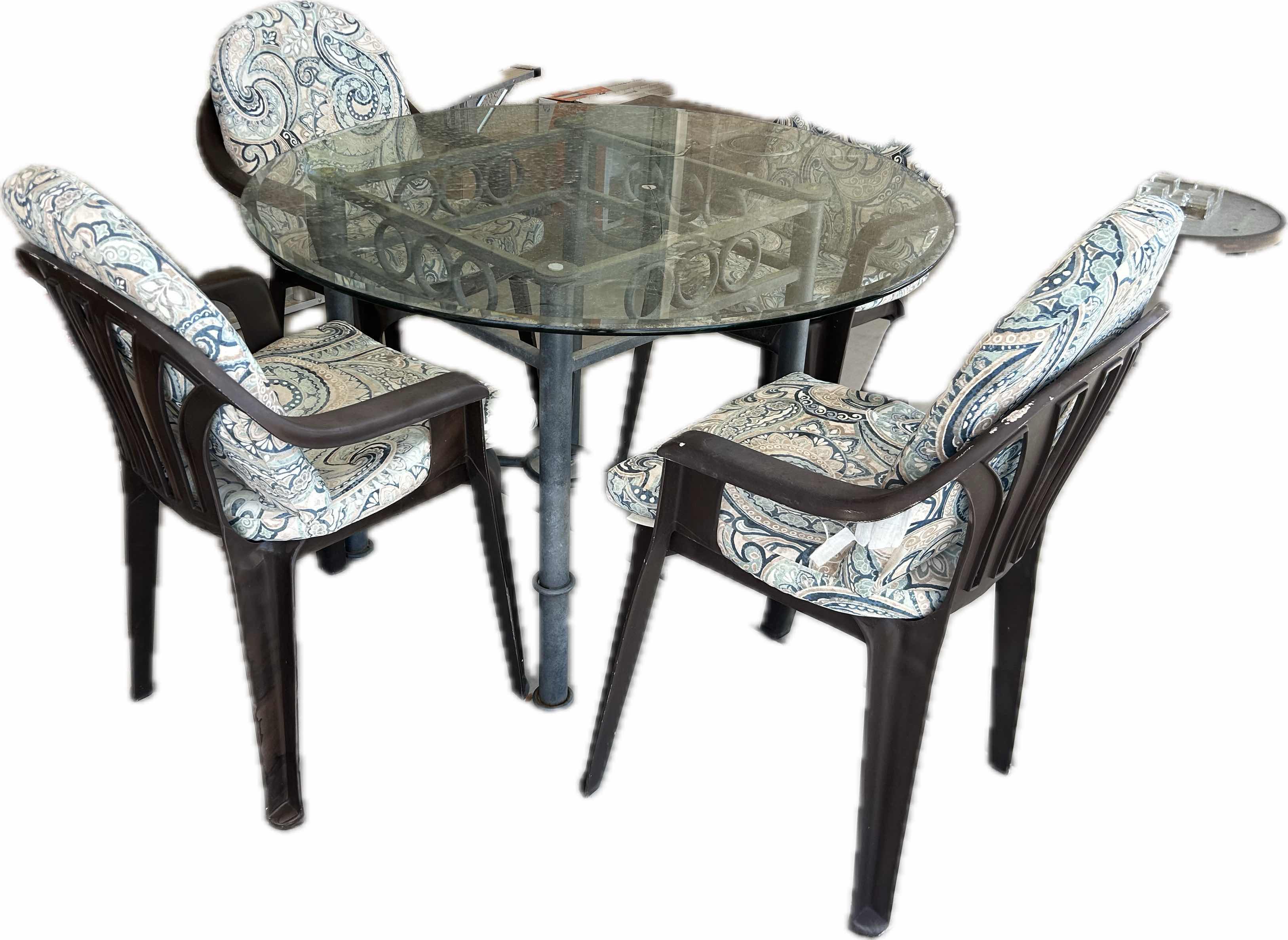 Photo 1 of ROUND GLASS TOP OUTDOOR TABLE W 4 CHAIRS