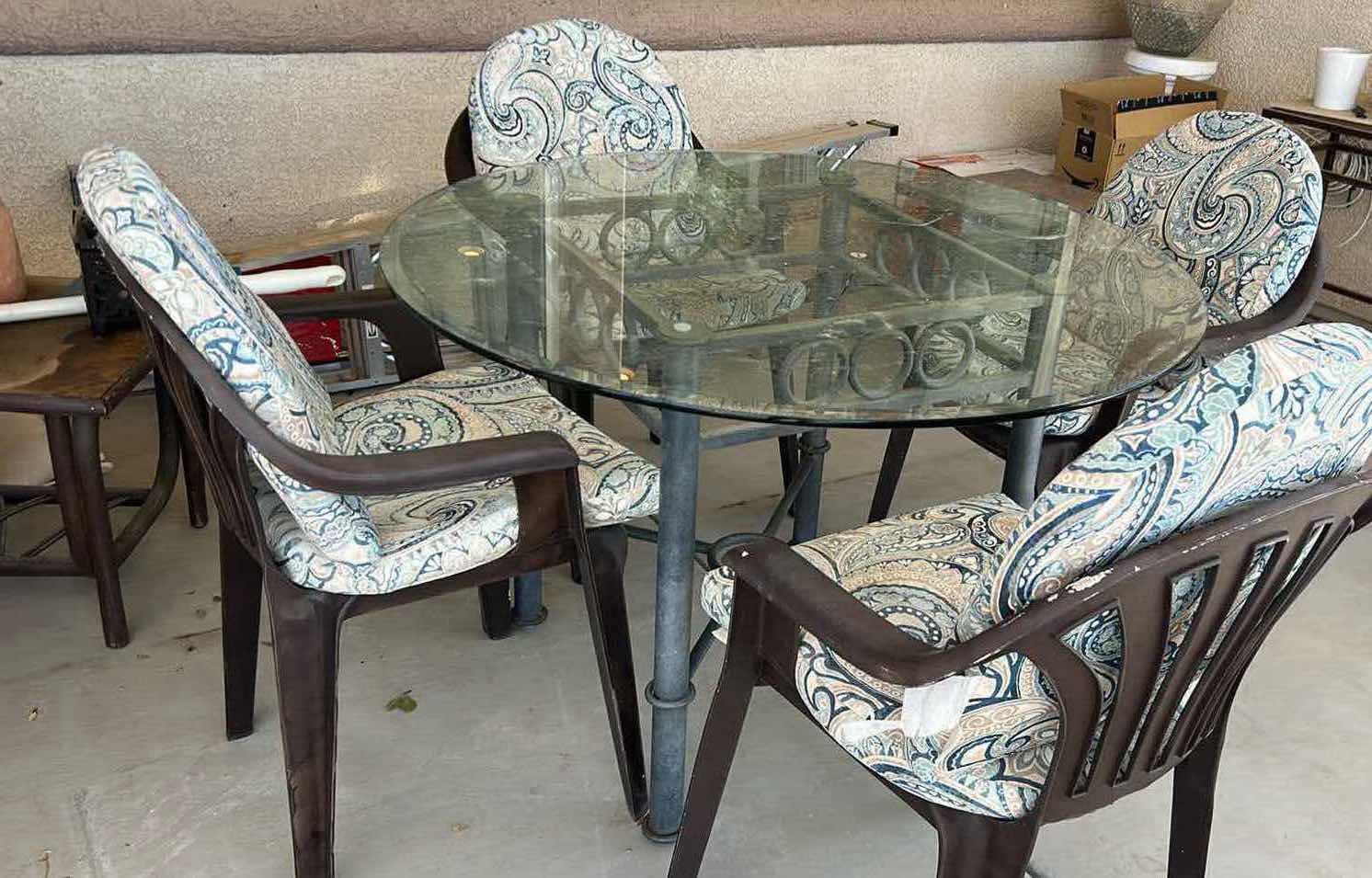 Photo 1 of ROUND GLASS TOP OUTDOOR TABLE W 4 CHAIRS