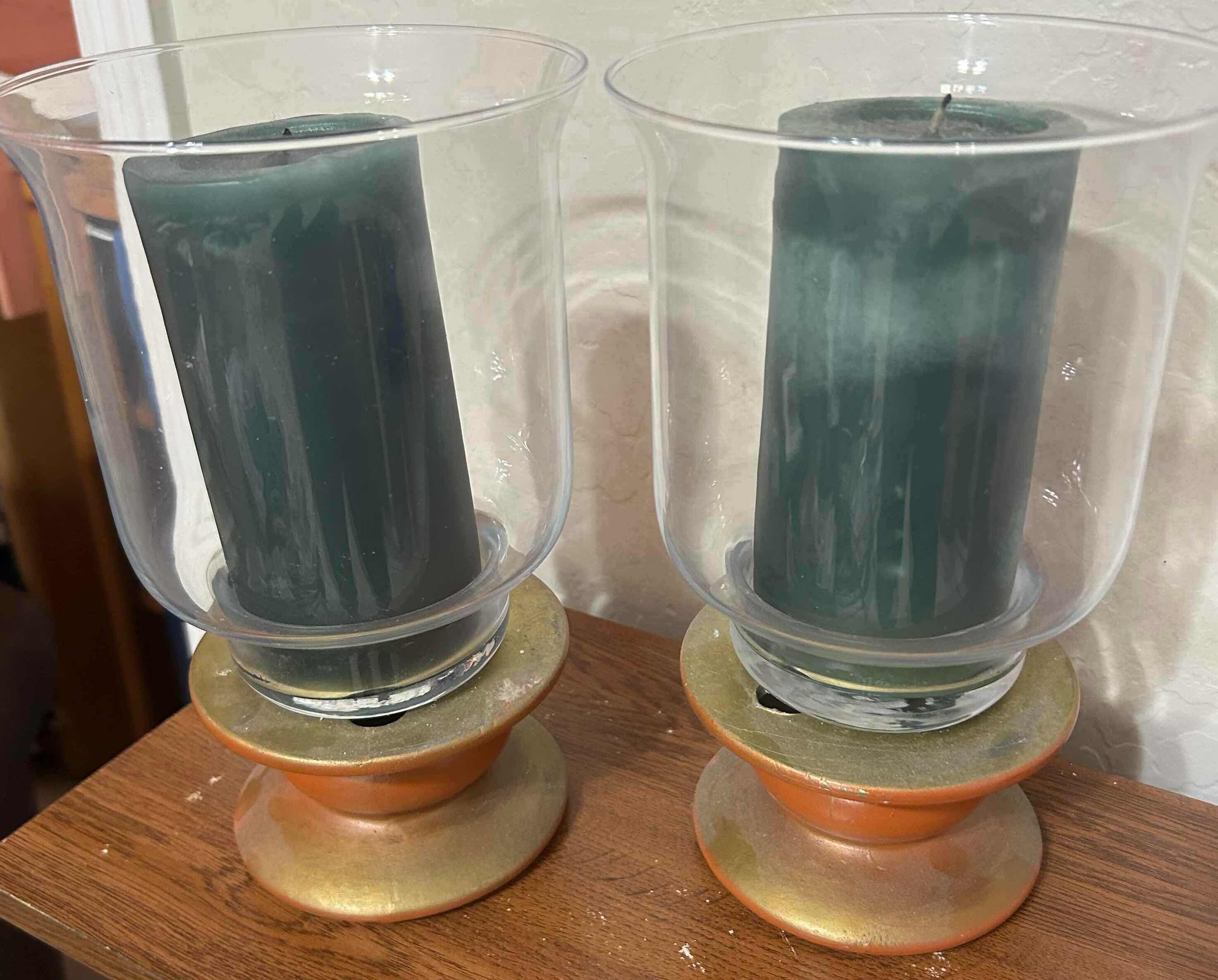 Photo 1 of 2 GLASS HURRICANE HOLDERS  W GREEN CANDLES H 11"