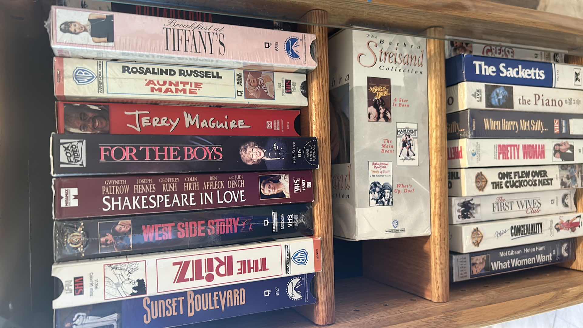 Photo 1 of CONTENTS OF BOX ASSORTED VHS SHELF SOLD SEPARATELY