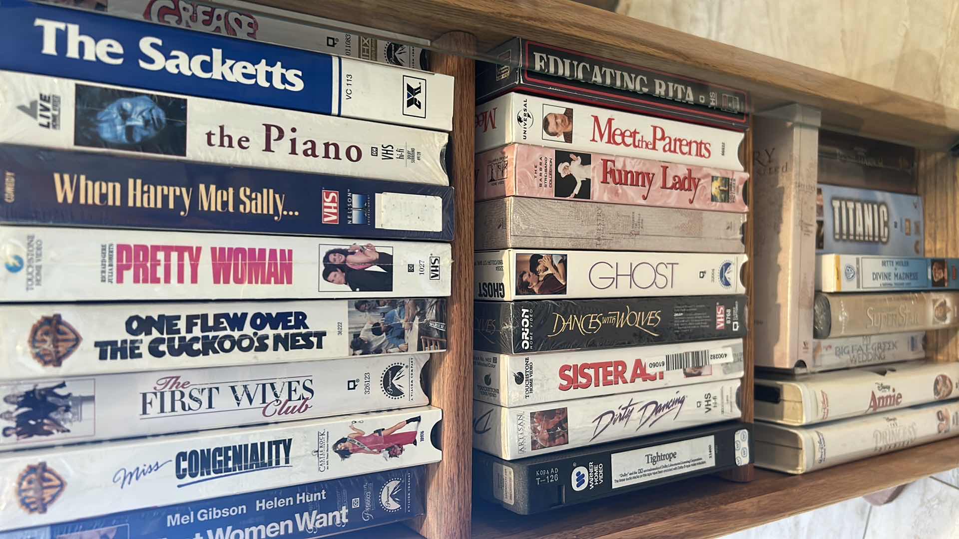 Photo 1 of CONTENTS OF BOX ASSORTED VHS SHELF SOLD SEPARATELY