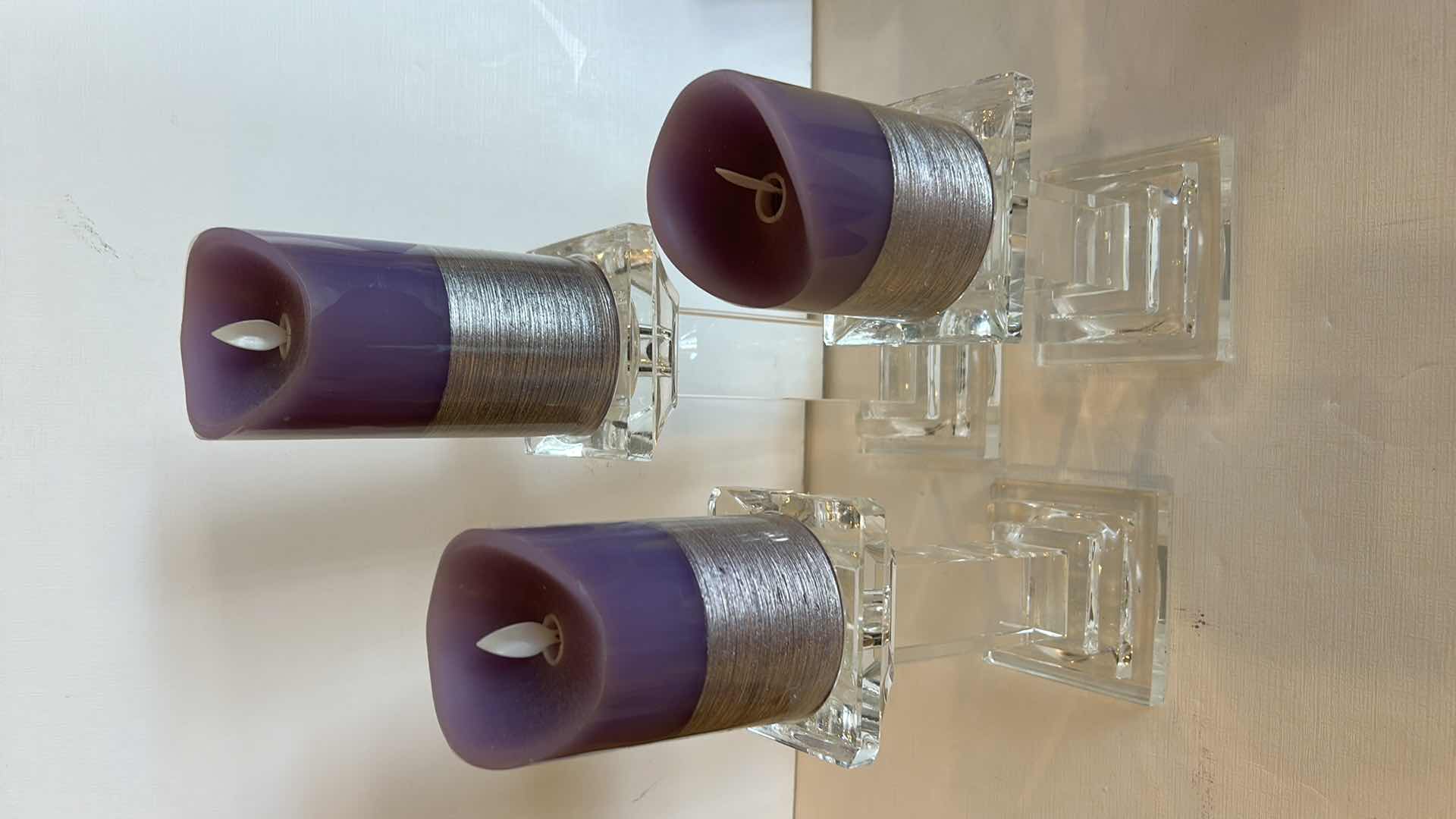 Photo 1 of 3 CANDLE HOLDERS  ( TALLEST H 8.75”) AND 3 BATTERY OPERATED CANDLES