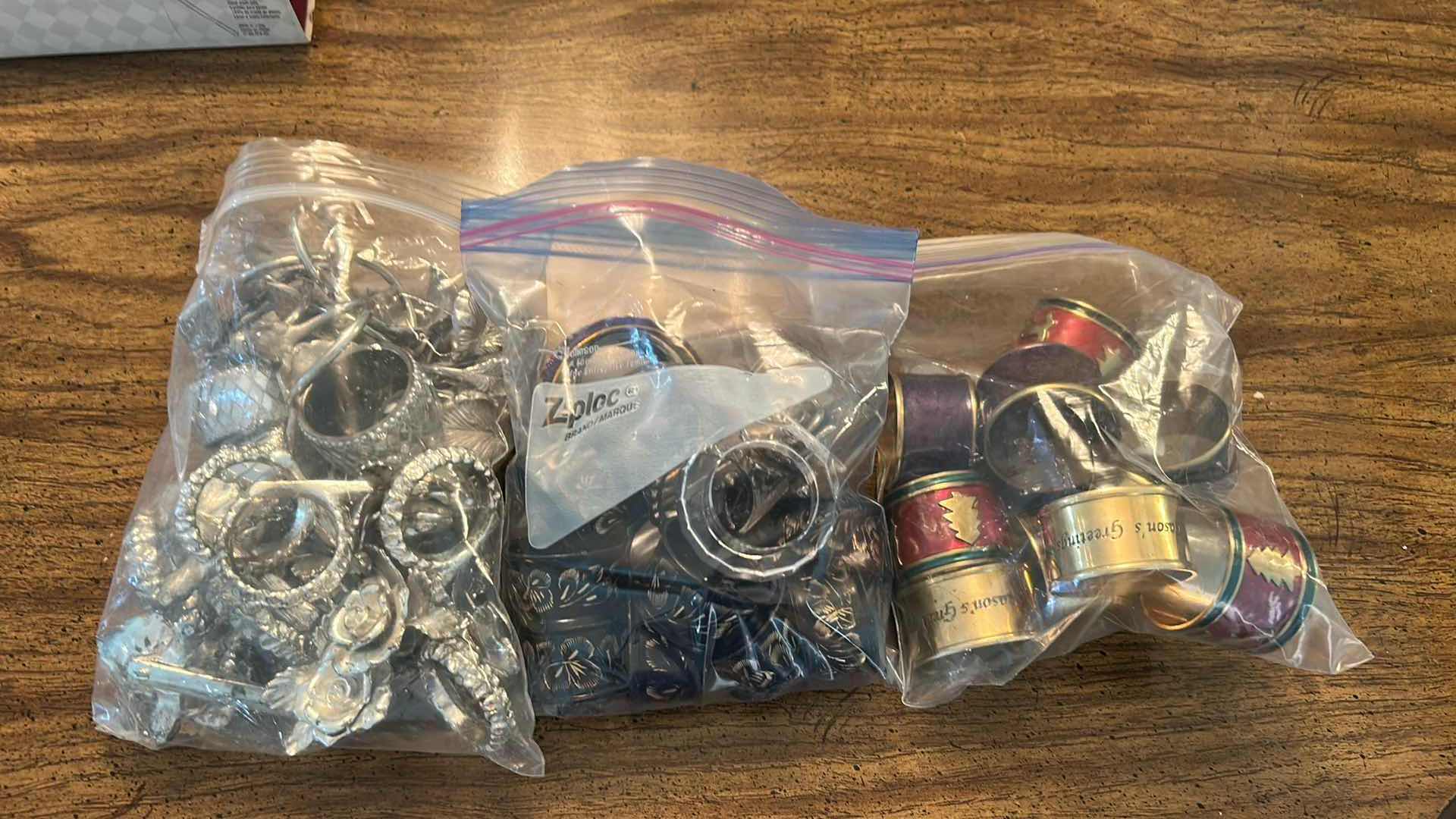 Photo 1 of 3- BAGS ASSORTED NAPKIN RINGS