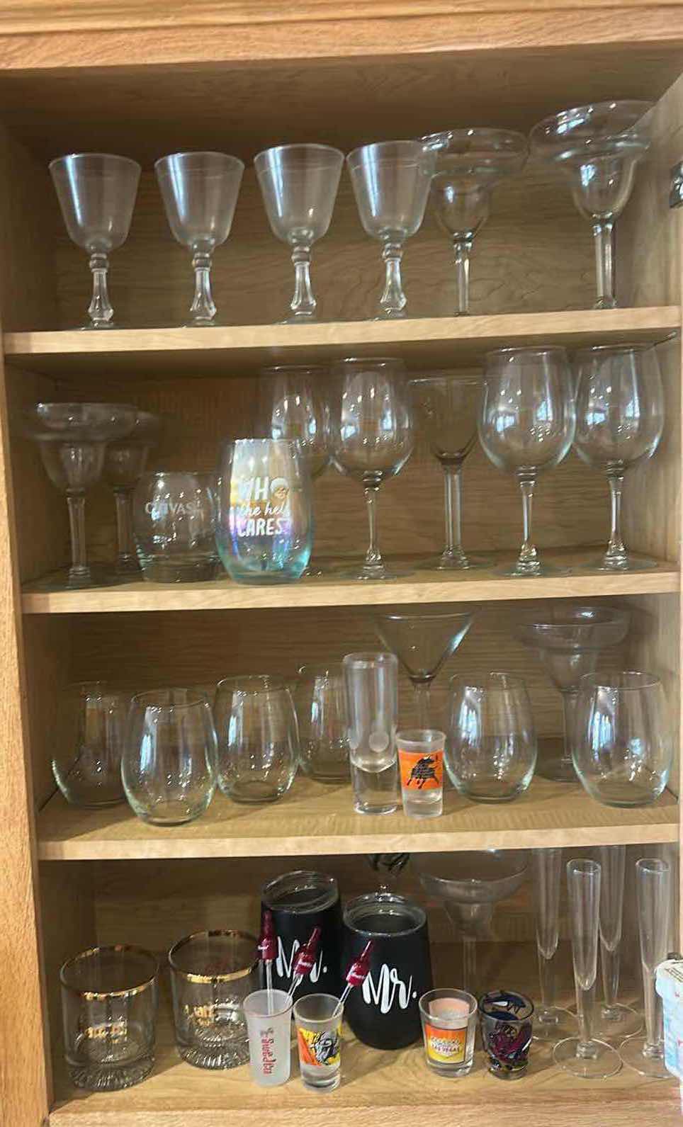 Photo 1 of STEMWARE AND GLASSES IN KITCHEN CABINET