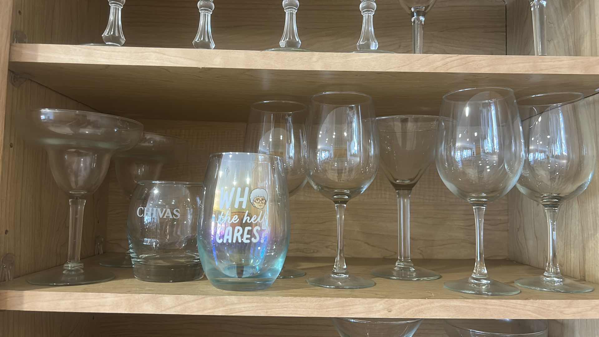 Photo 1 of STEMWARE AND GLASSES IN KITCHEN CABINET