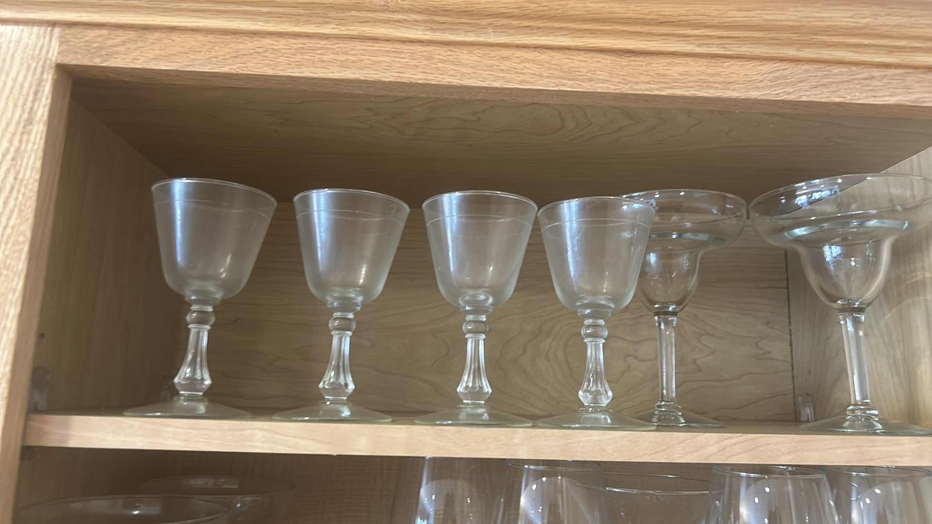 Photo 1 of STEMWARE AND GLASSES IN KITCHEN CABINET