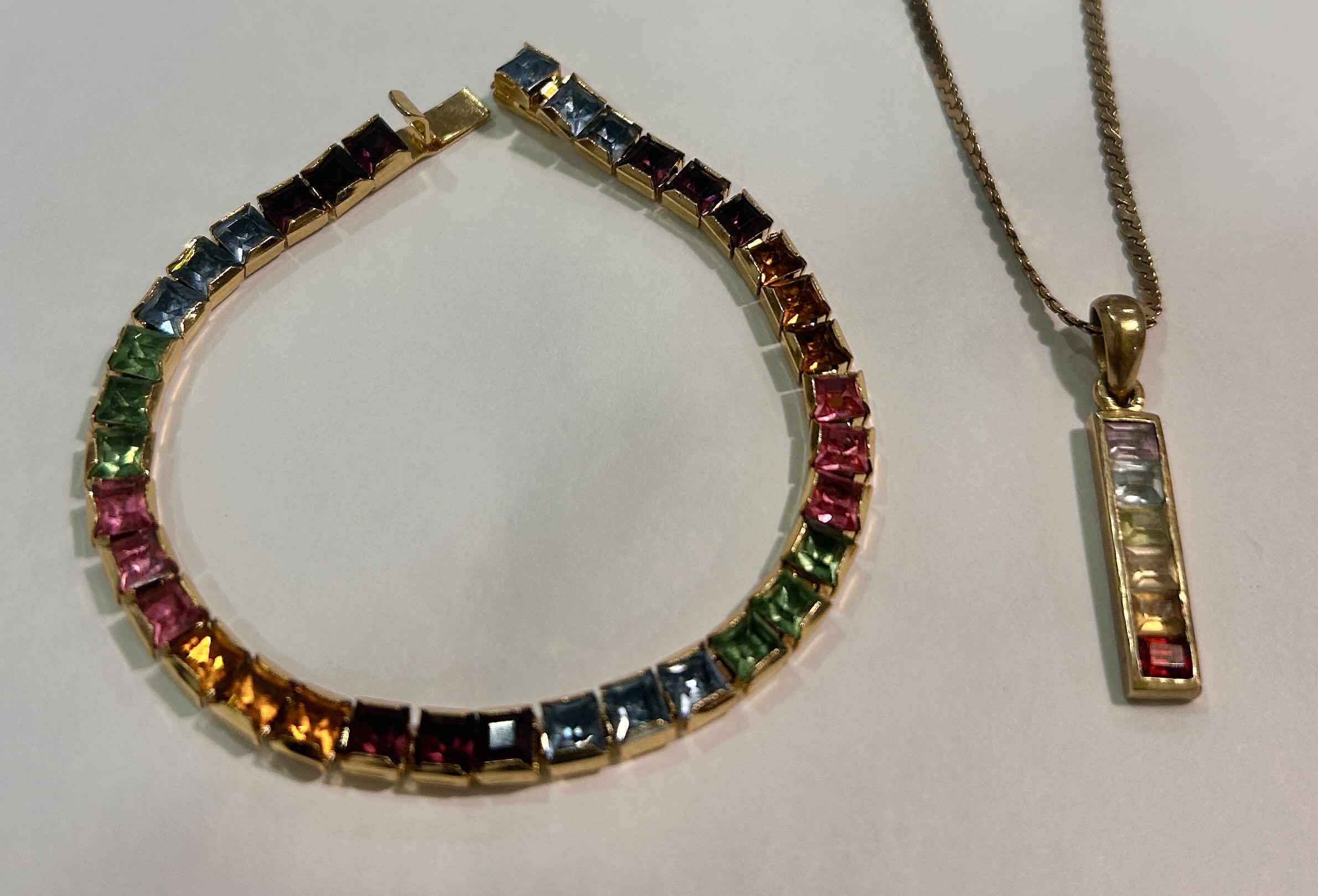 Photo 1 of 14K GOLD FROM ITALY, NECKLACE 17” PENDANT 1.25” WITH GEMSTONES AND 14K GOLD FROM ITALY GEMSTONE BRACELET 6” Est value $1800 - 3200