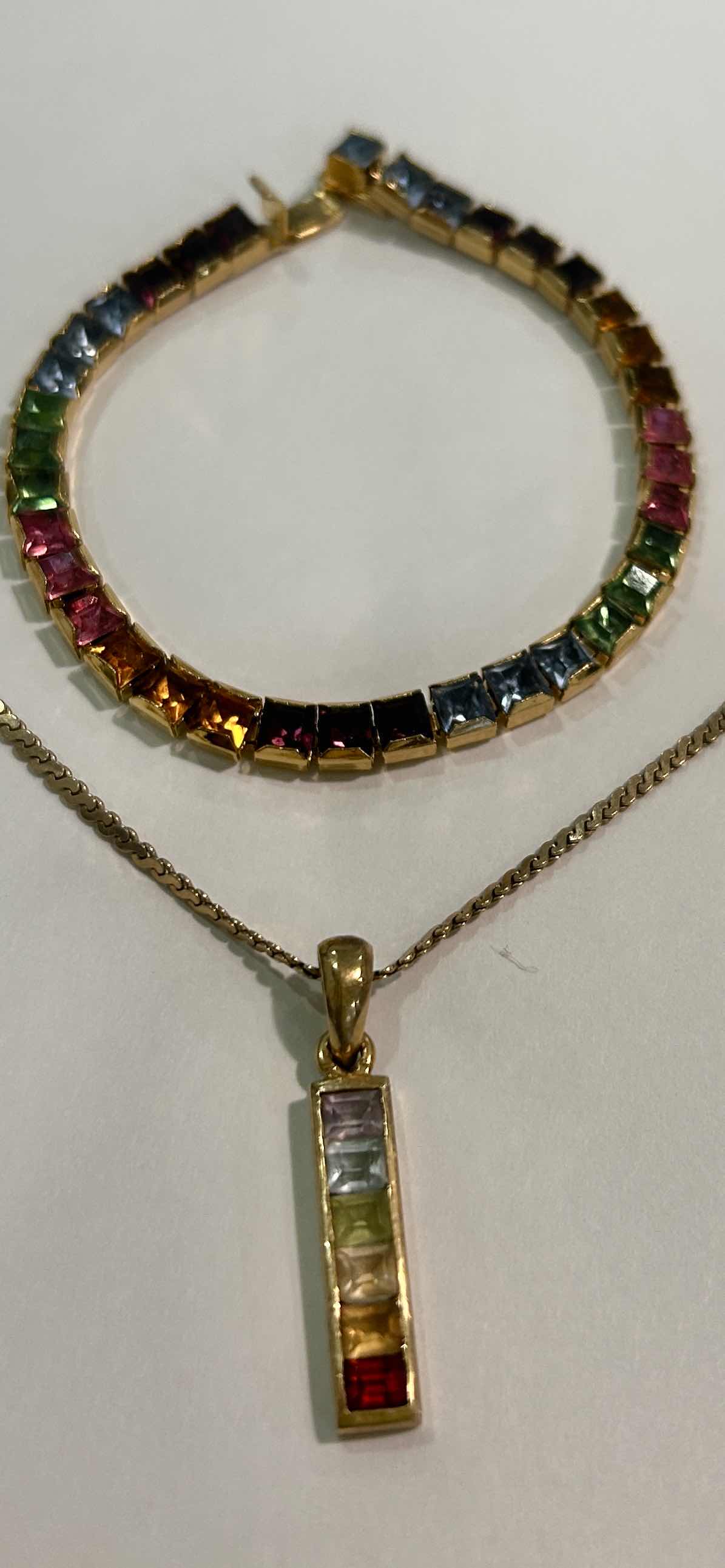 Photo 1 of 14K GOLD FROM ITALY, NECKLACE 17” PENDANT 1.25” WITH GEMSTONES AND 14K GOLD FROM ITALY GEMSTONE BRACELET 6” Est value $1800 - 3200