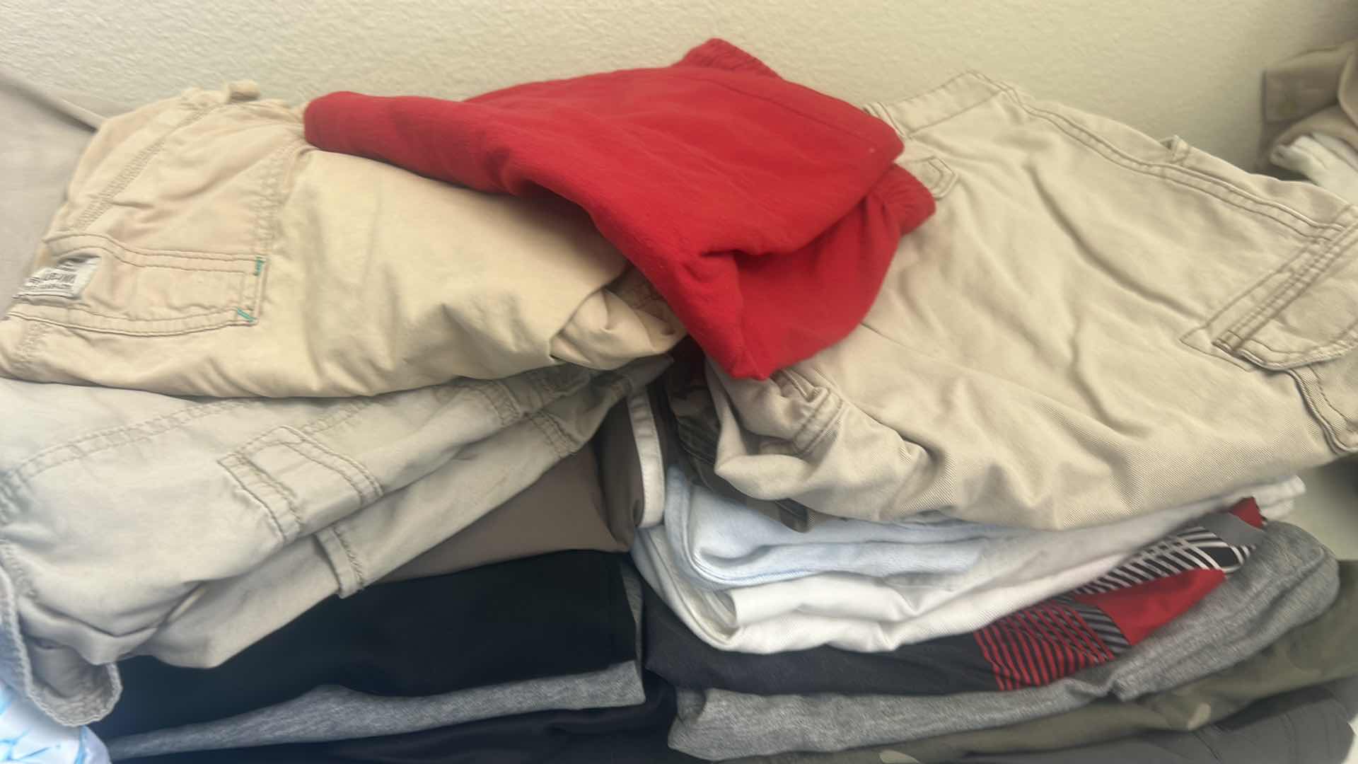 Photo 1 of MENS & WOMENS CLOTHING ASSORTMENT