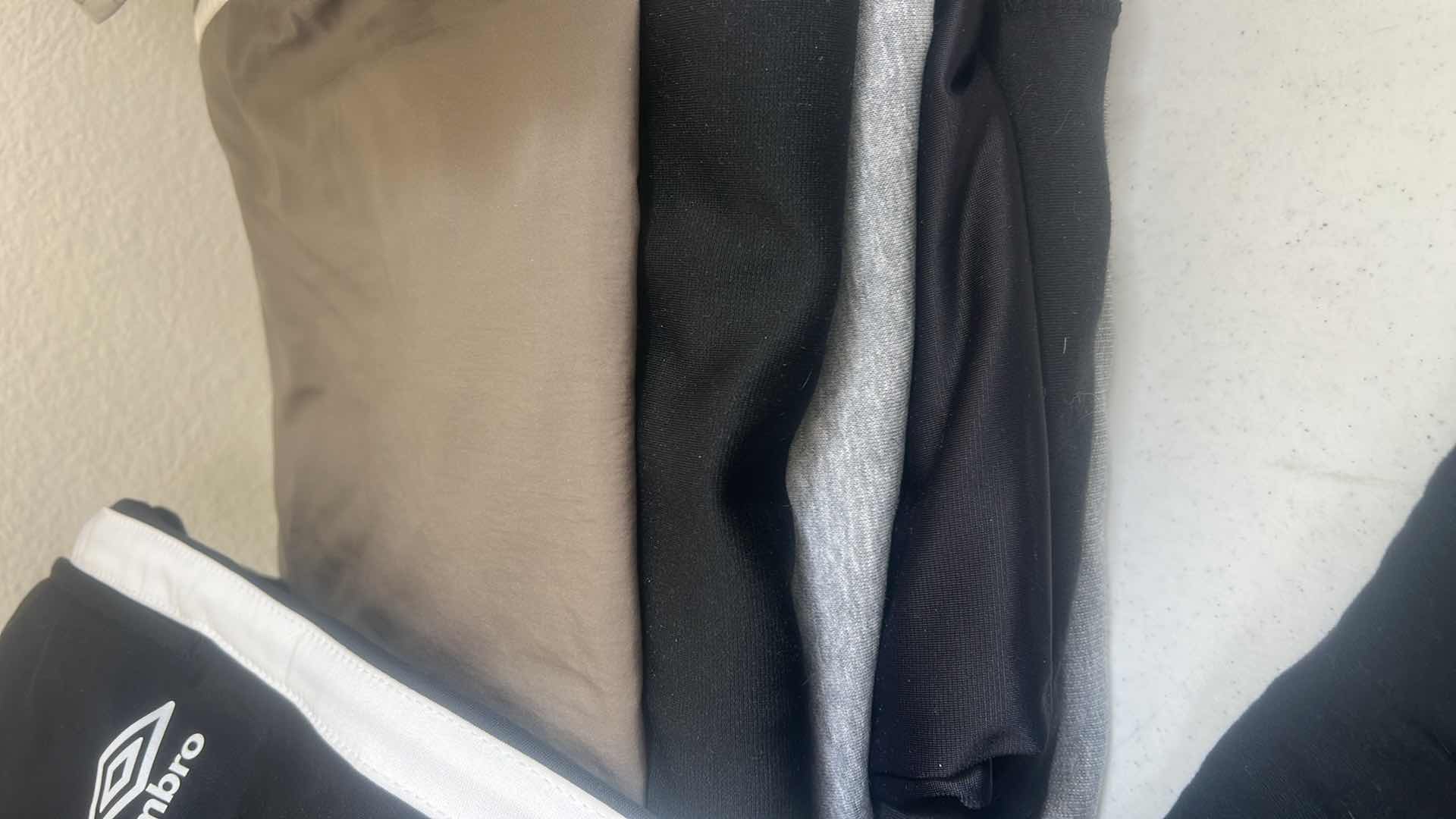 Photo 1 of MENS & WOMENS CLOTHING ASSORTMENT