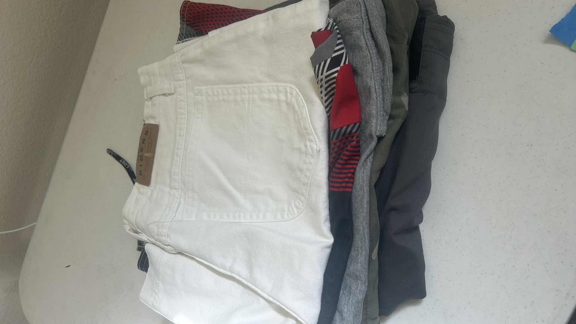 Photo 1 of MENS & WOMENS CLOTHING ASSORTMENT
