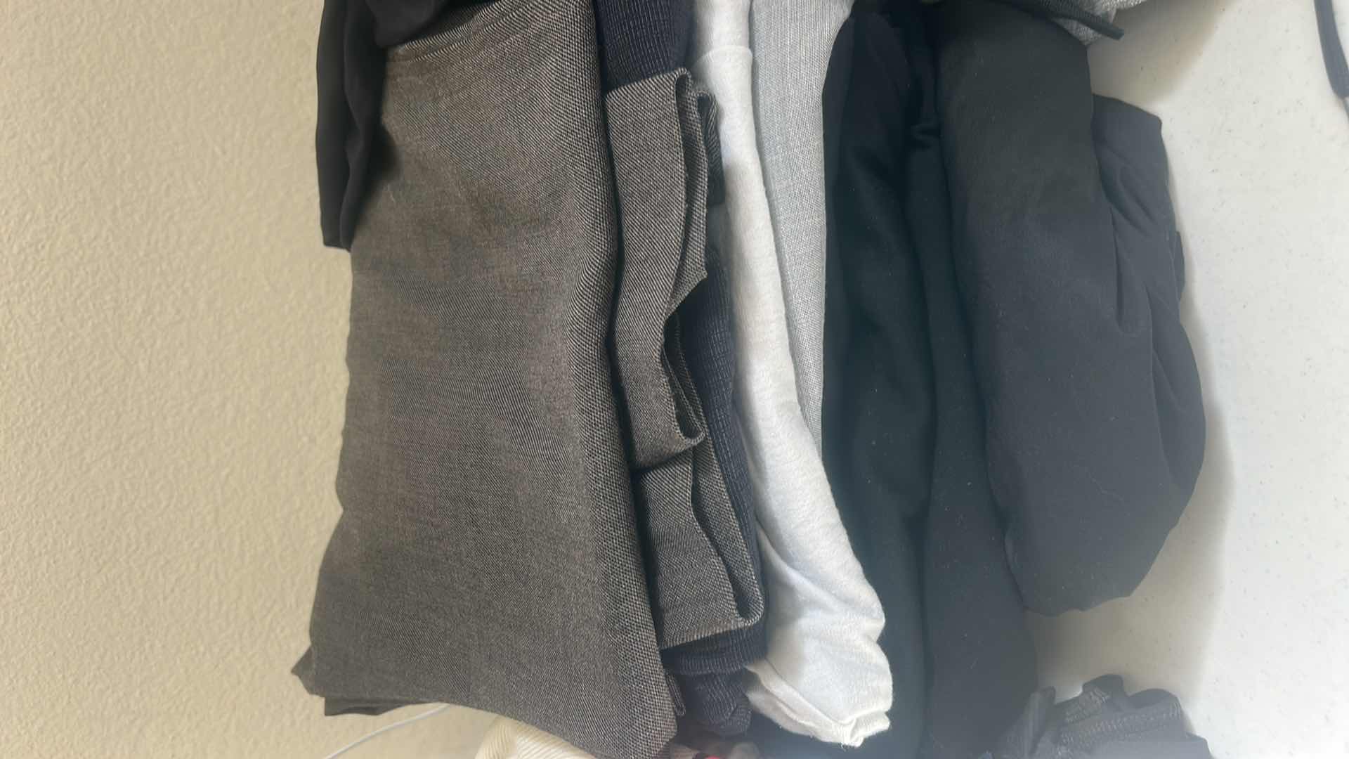 Photo 1 of MENS & WOMENS CLOTHING ASSORTMENT