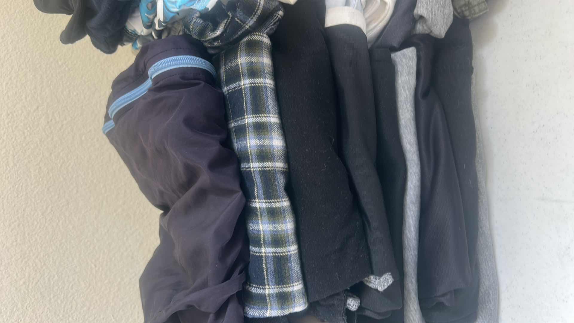 Photo 1 of MENS & WOMENS CLOTHING ASSORTMENT