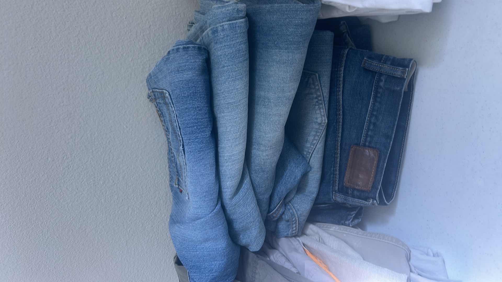 Photo 1 of MENS CLOTHING ASSORTMENT SIZES M-L