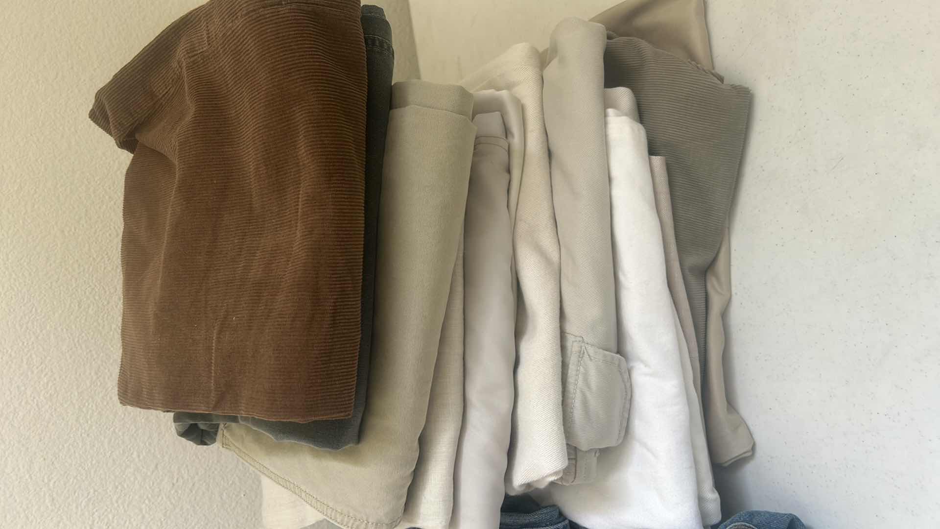 Photo 1 of MENS CLOTHING ASSORTMENT SIZES M-L