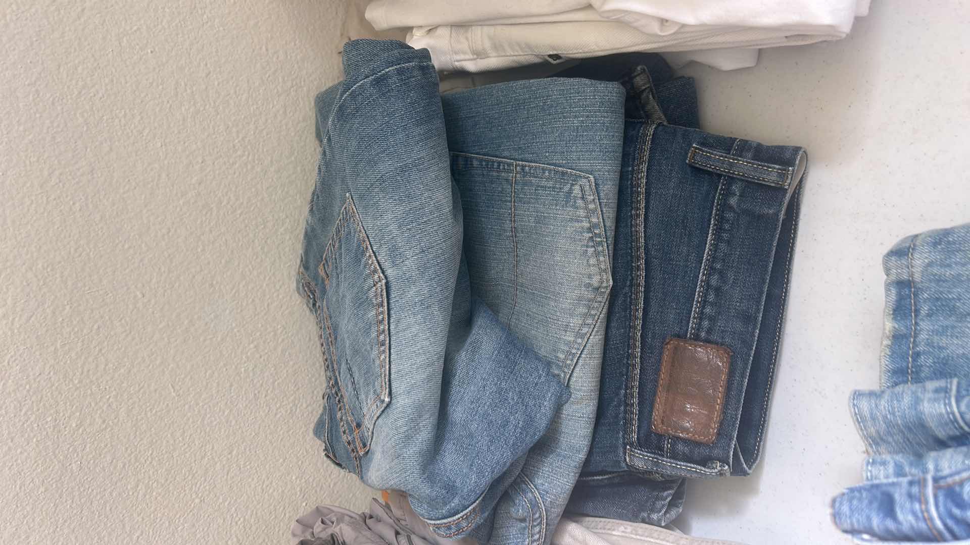 Photo 1 of MENS CLOTHING ASSORTMENT SIZES M-L