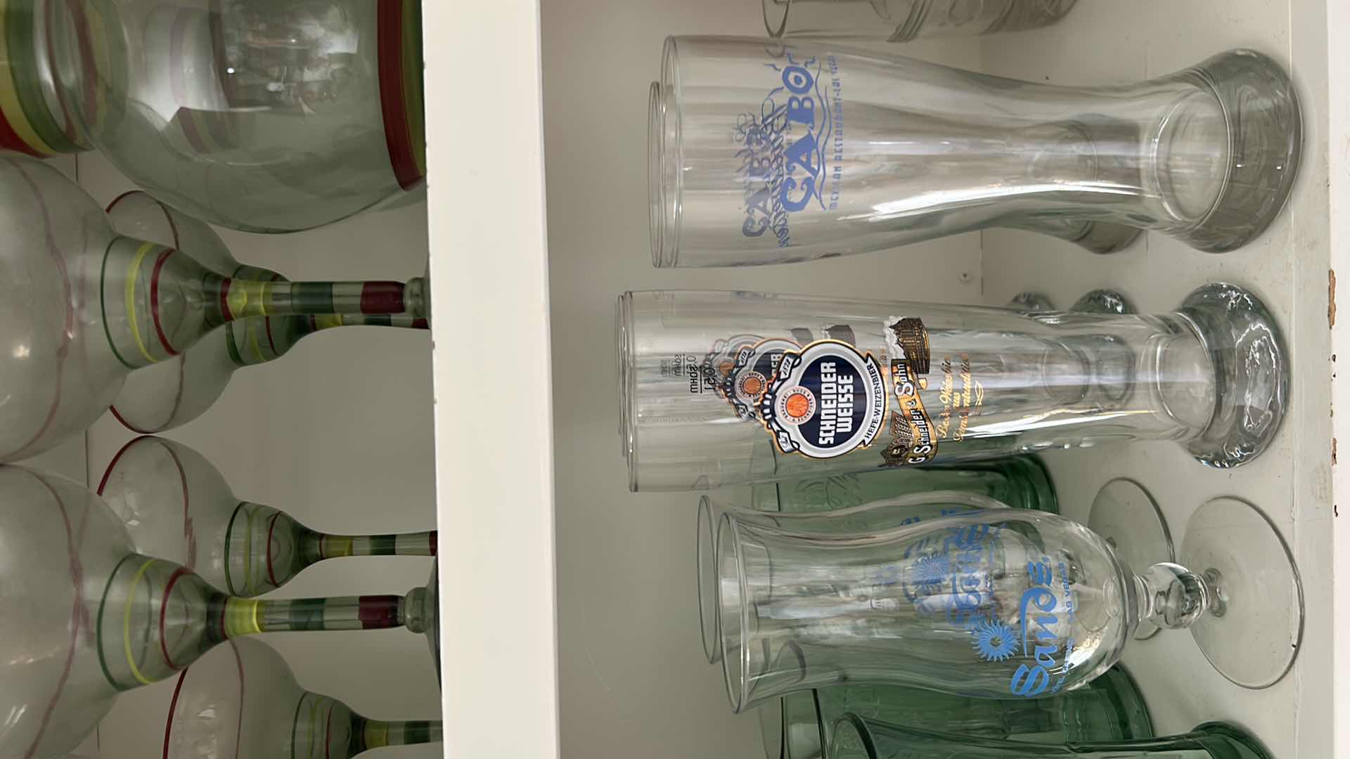 Photo 1 of CONTENTS OF CABINET ASSORTED CASINO GLASSWARE