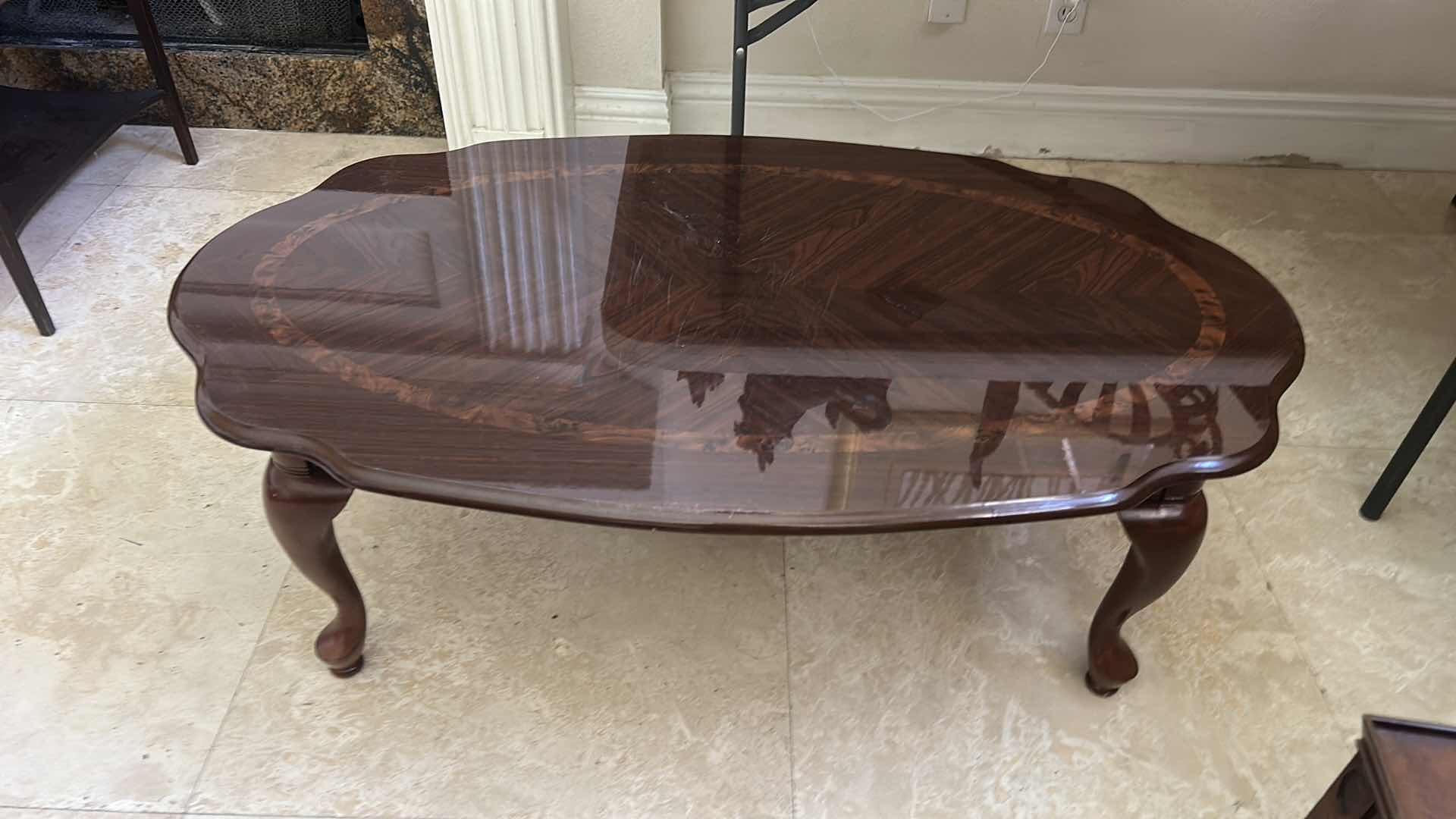 Photo 2 of CHERRY WOOD COCKTAIL TABLE 
45“ x 27“ x H16 1/4”