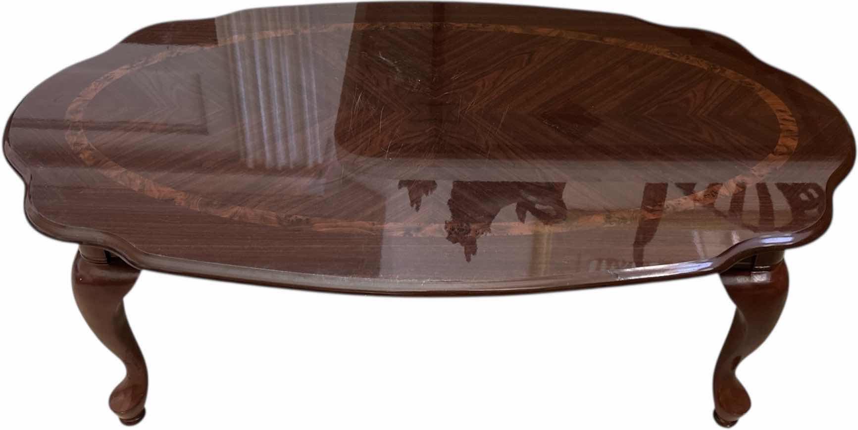 Photo 1 of CHERRY WOOD COCKTAIL TABLE 
45“ x 27“ x H16 1/4”