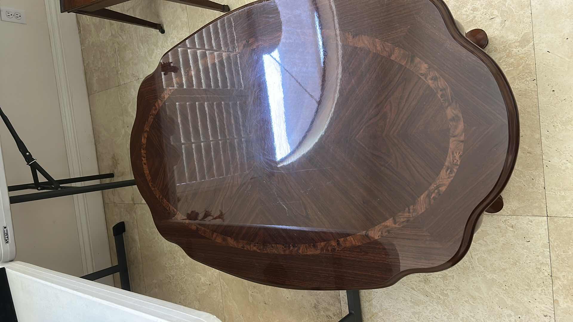 Photo 3 of CHERRY WOOD COCKTAIL TABLE 
45“ x 27“ x H16 1/4”