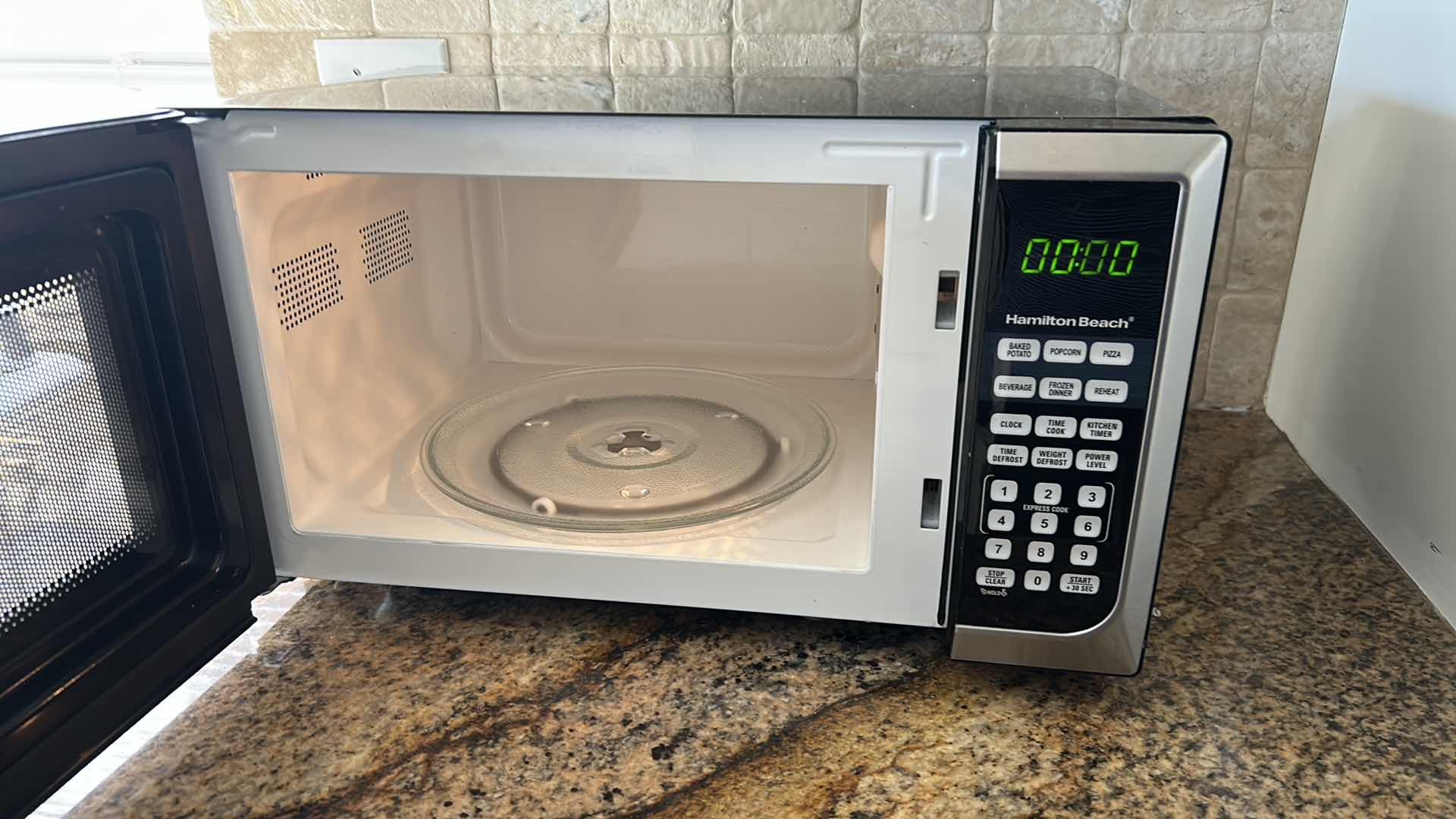 Photo 1 of HAMILTON BEACH COUNTERTOP MICROWAVE 19" X 13"