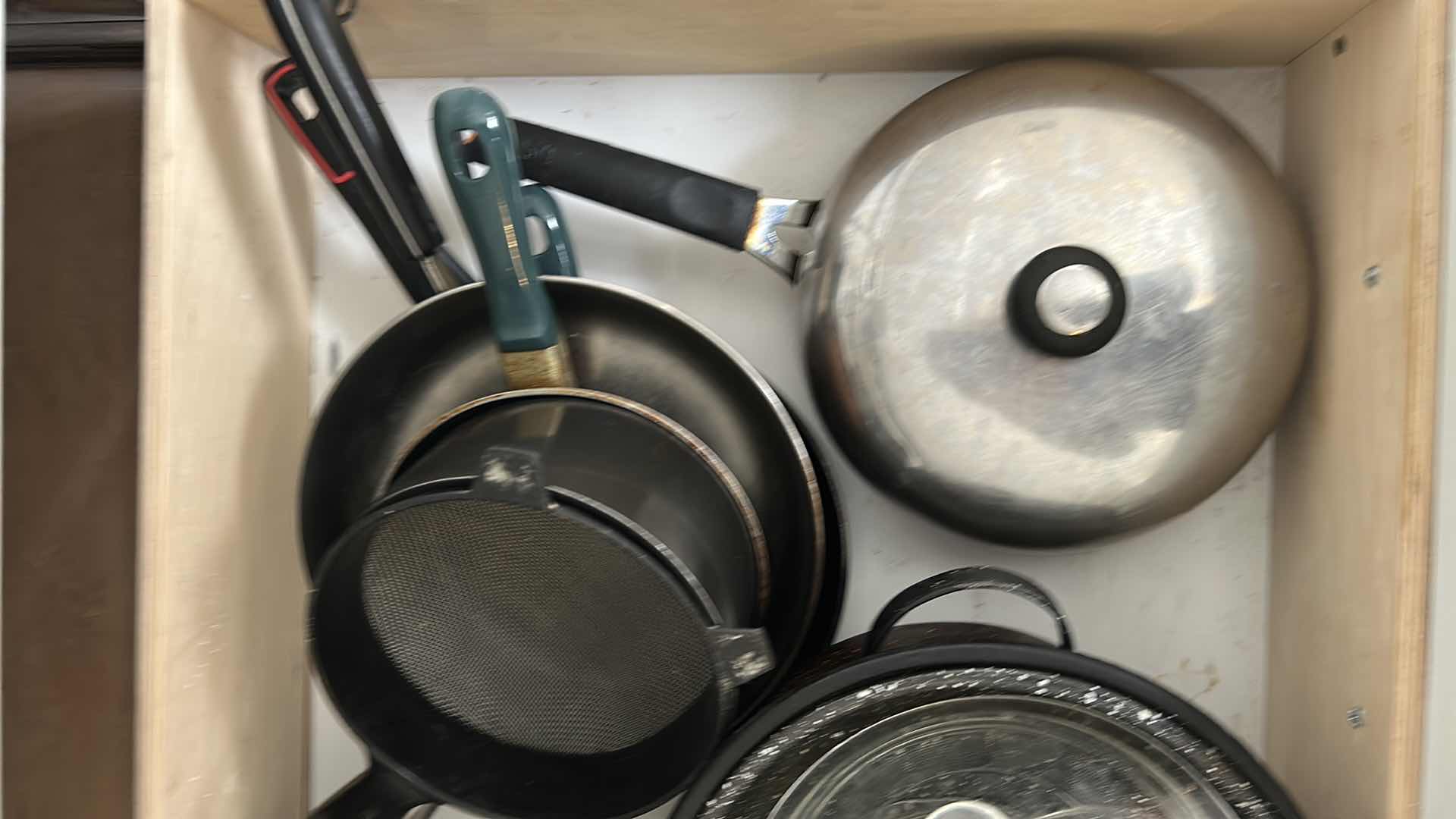 Photo 1 of CONTENTS OF DRAWER COOKWARE