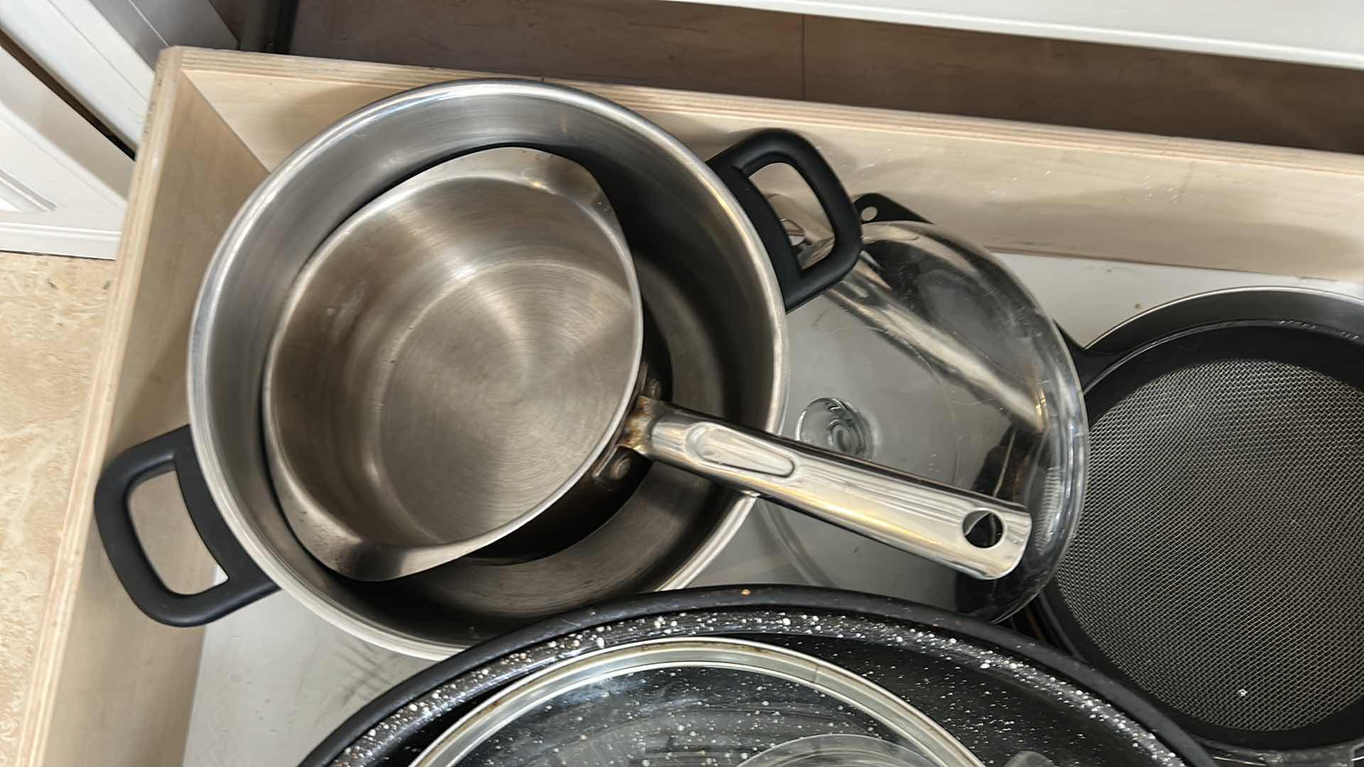 Photo 1 of CONTENTS OF DRAWER COOKWARE