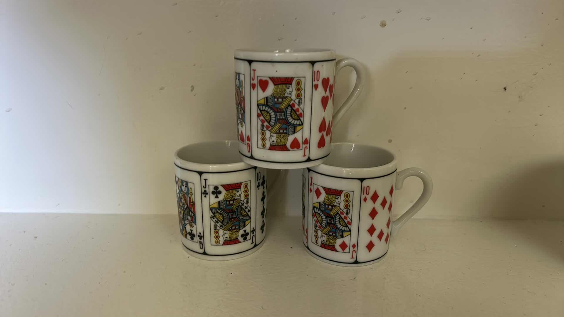 Photo 1 of 2 EA  DEMITASSE CUPS AND SAUCERS, PLAYING CARD PATTERN . & 3 MORE CUPS